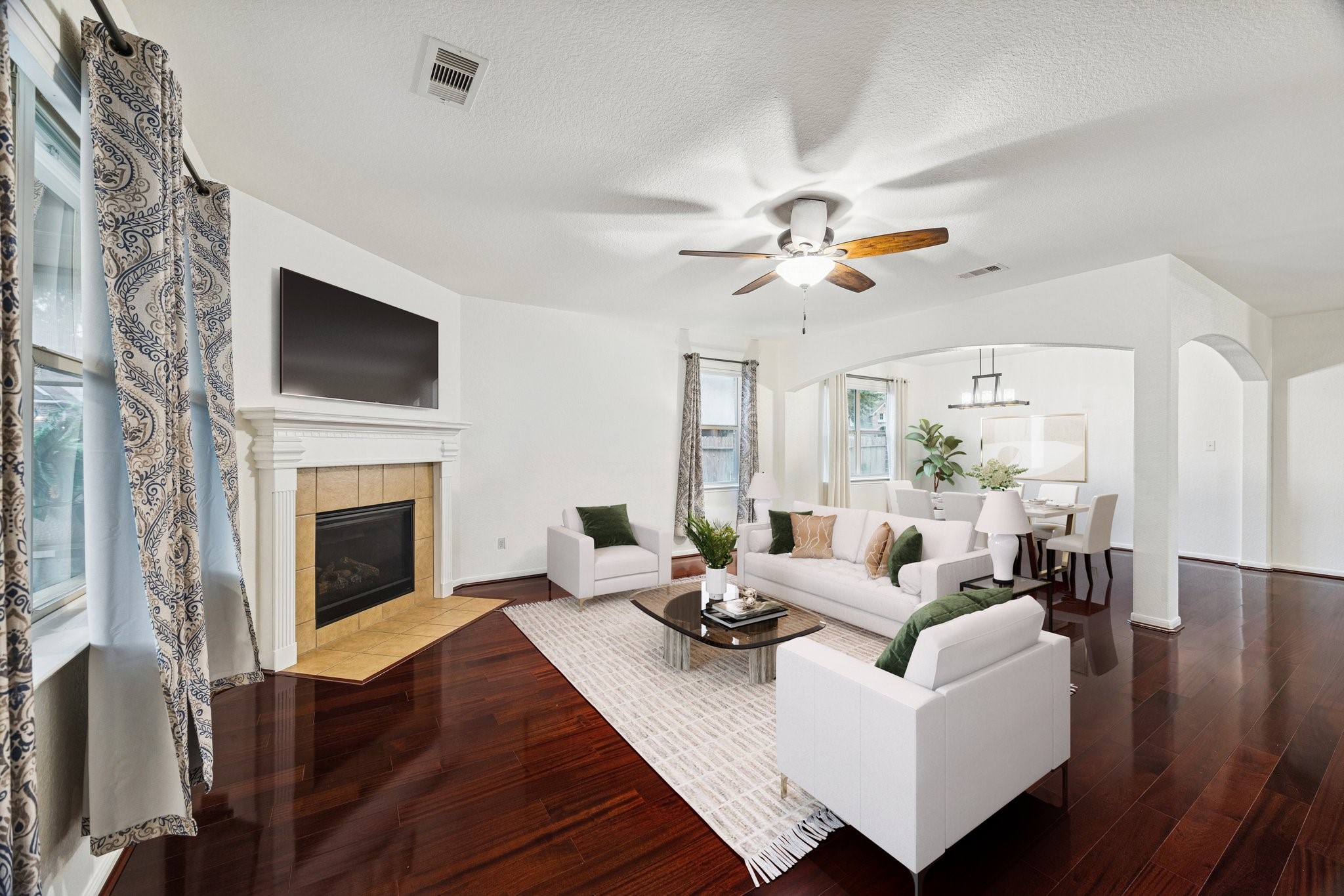191 Maple Grove Drive Conroe, TX 77384 - Photo 5 of 27 A secondary view of the living and dining room. (Virtually staged).