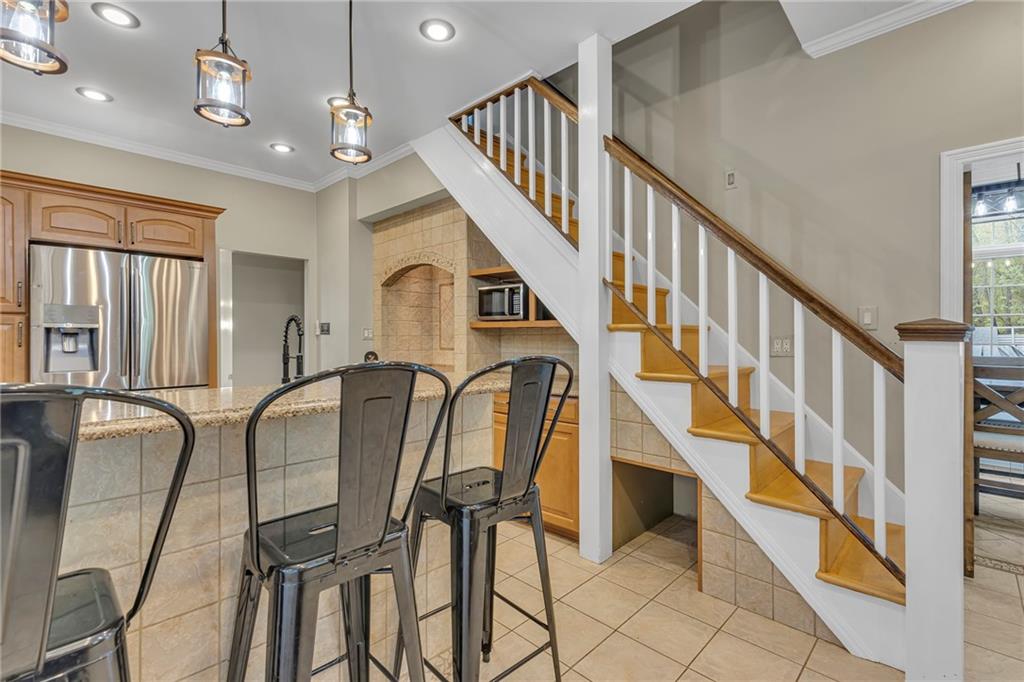 545 6th Avenue Freedom, PA 15042 - Photo 13 of 50 a dining room with furniture and stairs