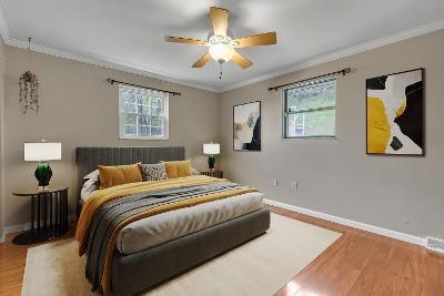 545 6th Avenue Freedom, PA 15042 - Photo 22 of 50 a bedroom with a bed and a chandelier