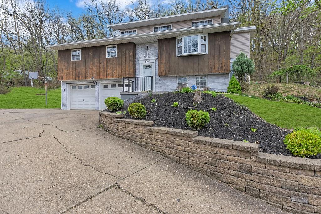 545 6th Avenue Freedom, PA 15042 - Photo 4 of 50 a front view of a house with garden