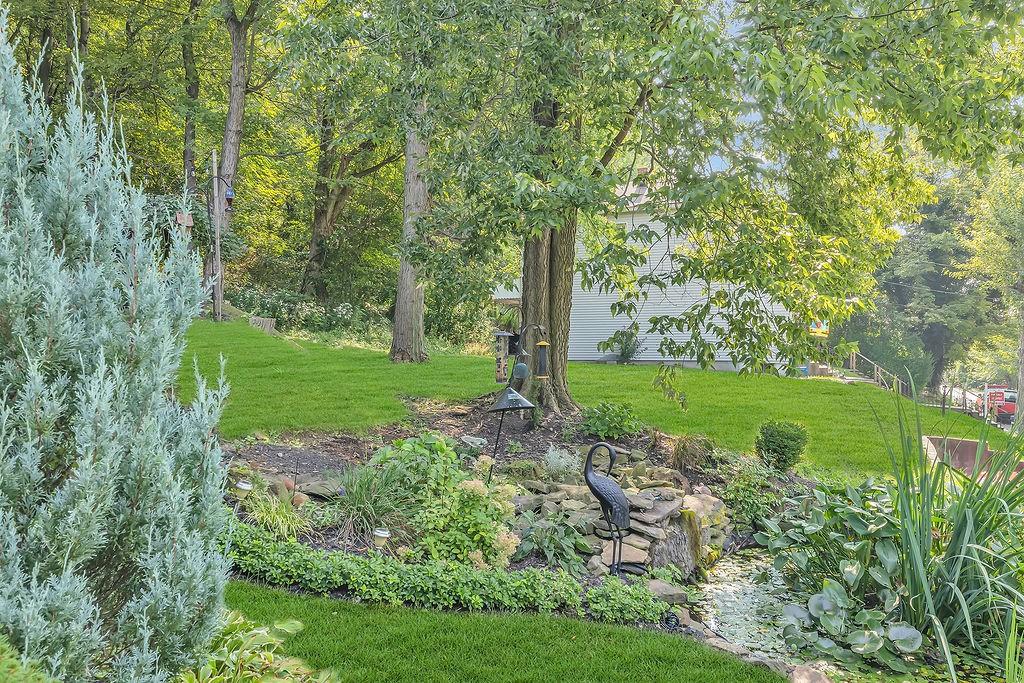 545 6th Avenue Freedom, PA 15042 - Photo 47 of 50 a view of a garden with a tree