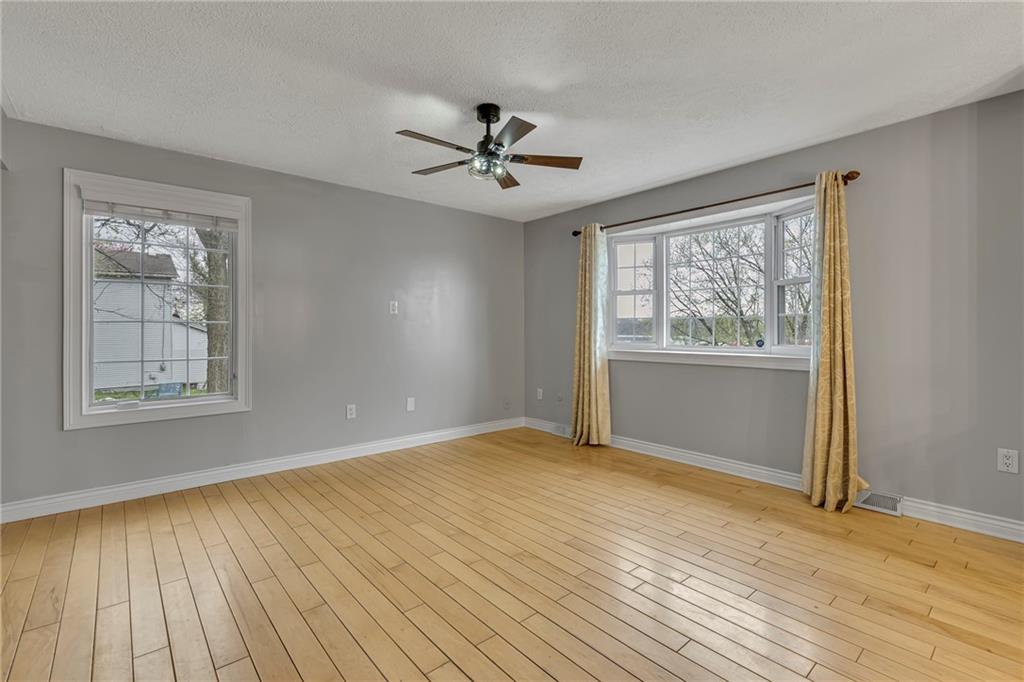 545 6th Avenue Freedom, PA 15042 - Photo 6 of 50 wooden floor in an empty room with a window