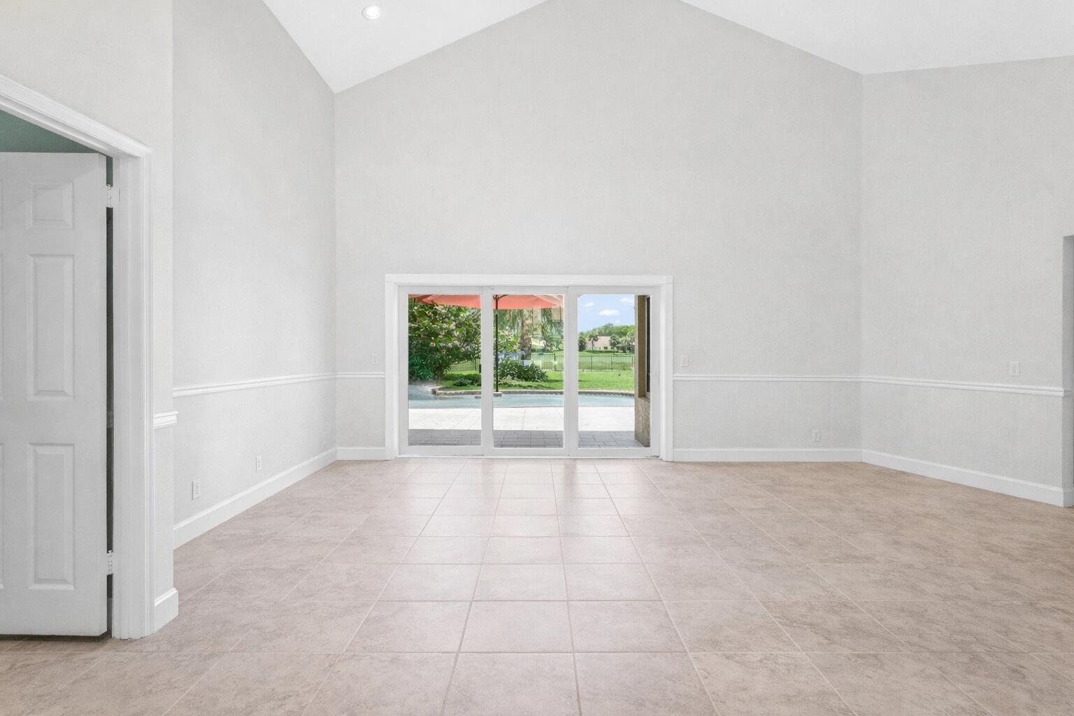 5986 Vista Linda Lane Boca Raton, FL 33433 - Photo 11 of 31 a view of an empty room with a window