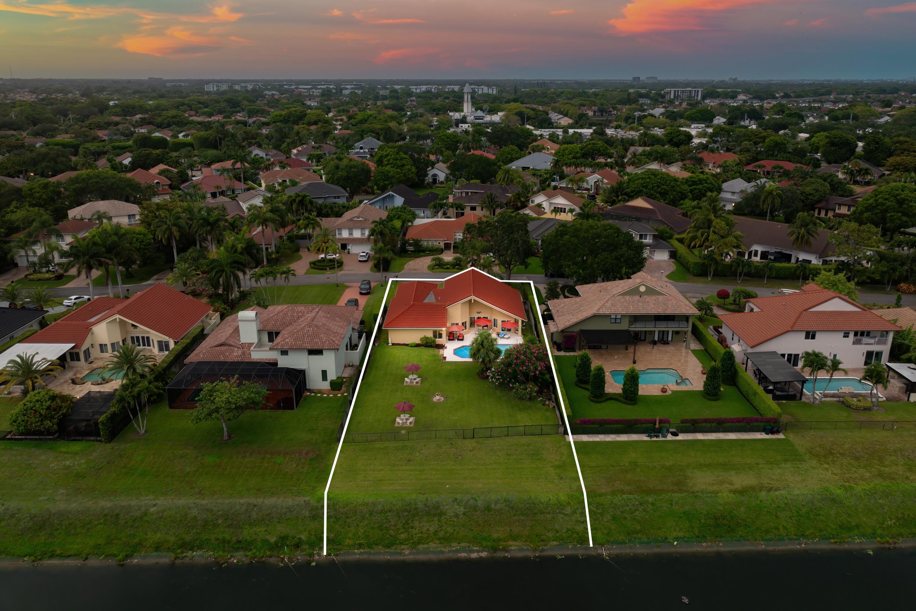 5986 Vista Linda Lane Boca Raton, FL 33433 - Photo 14 of 31 an aerial view of residential houses with outdoor space and trees