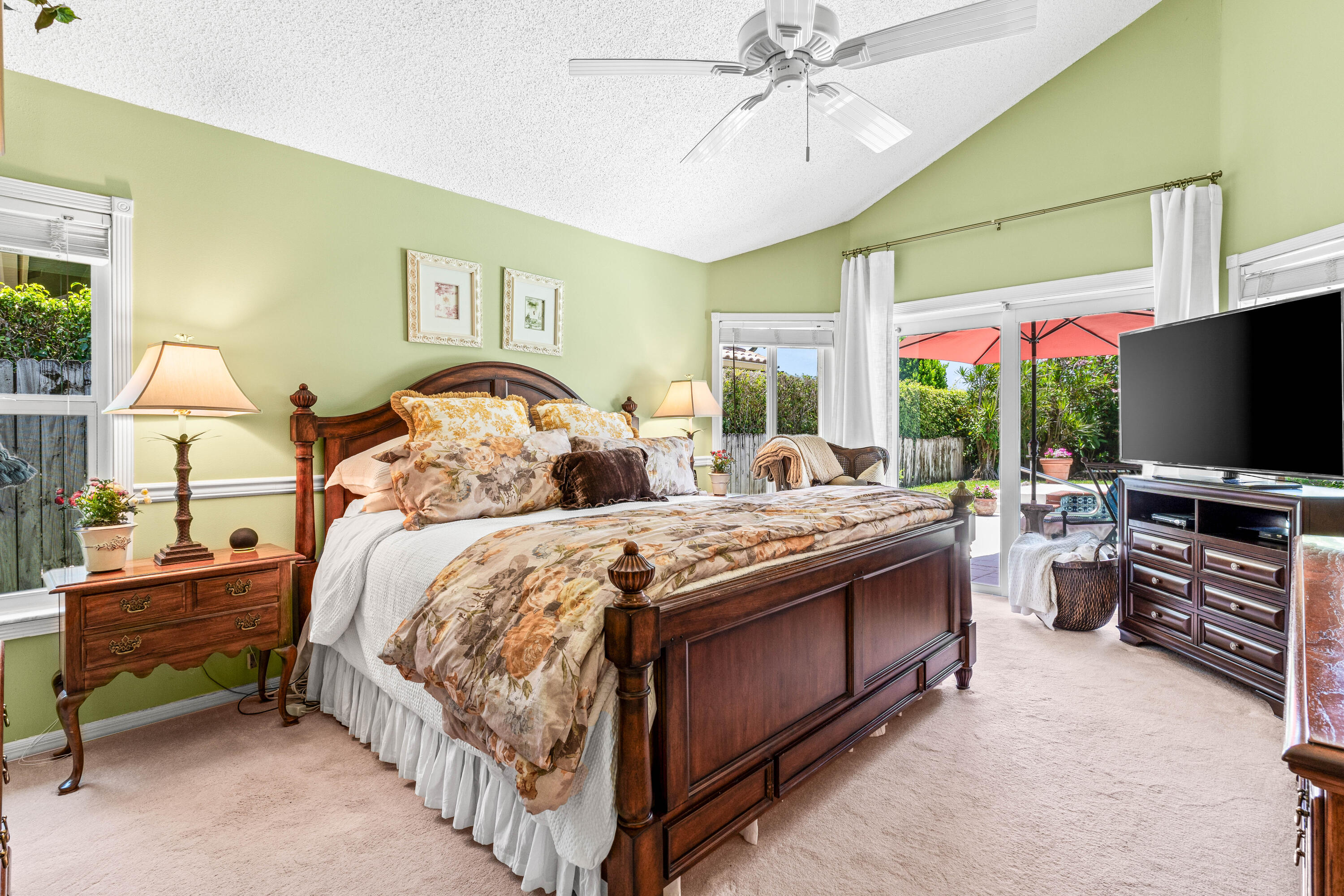 5986 Vista Linda Lane Boca Raton, FL 33433 - Photo 16 of 31 a bedroom with bed and flat screen tv