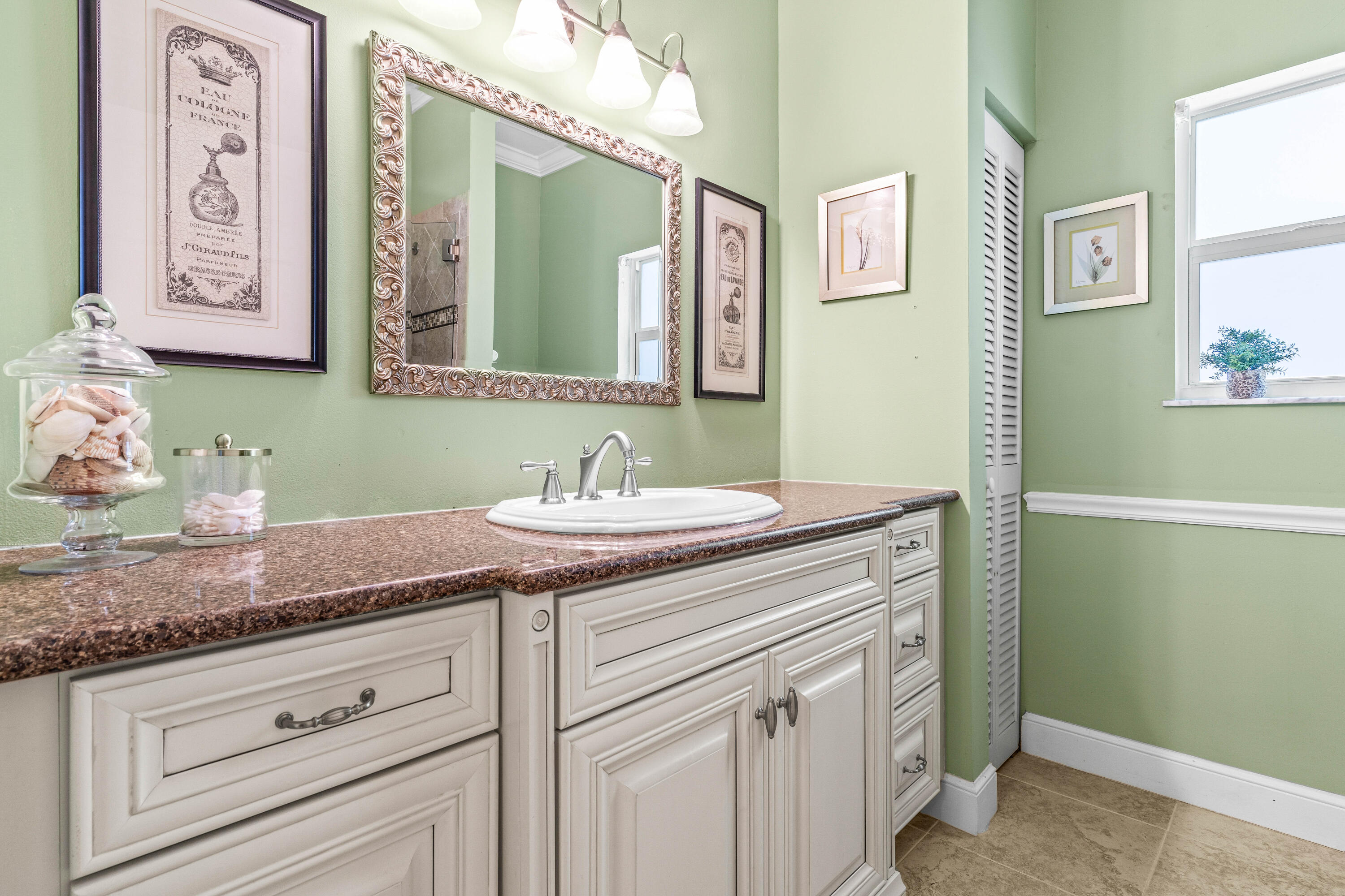 5986 Vista Linda Lane Boca Raton, FL 33433 - Photo 20 of 31 a bathroom with a granite countertop sink and a mirror