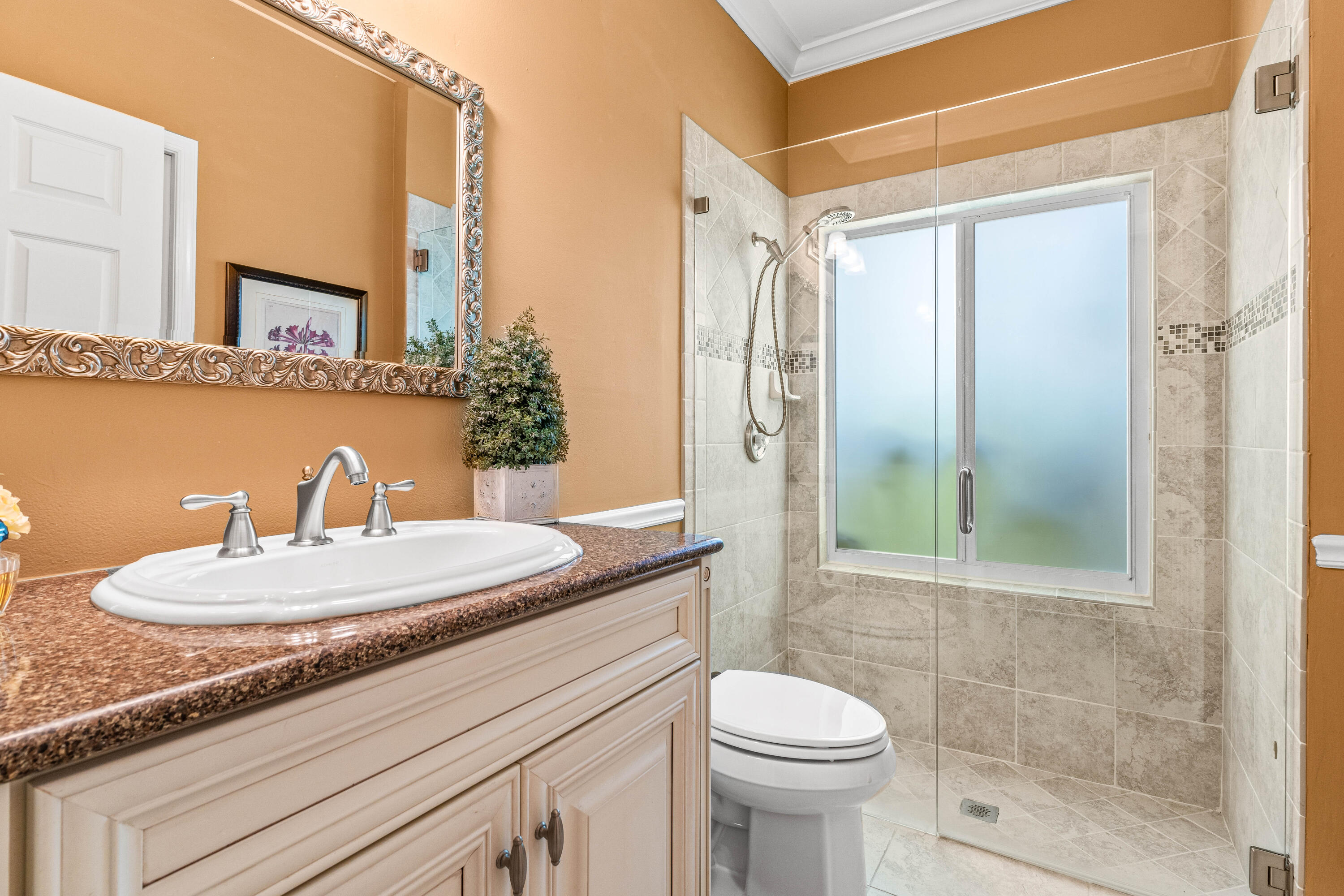 5986 Vista Linda Lane Boca Raton, FL 33433 - Photo 22 of 31 a bathroom with a granite countertop sink toilet a mirror and shower