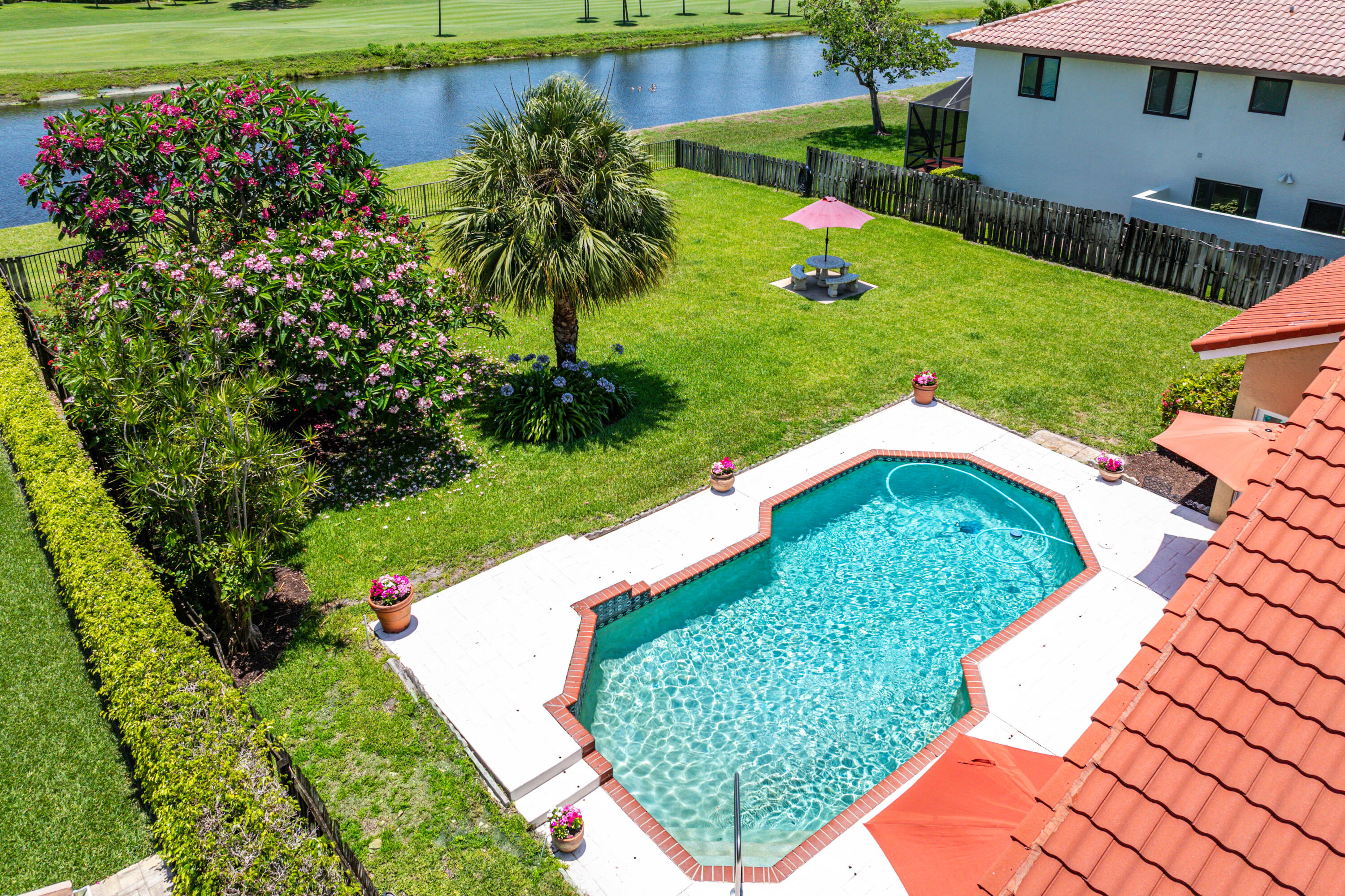 5986 Vista Linda Lane Boca Raton, FL 33433 - Photo 24 of 31 a view of a backyard with plants