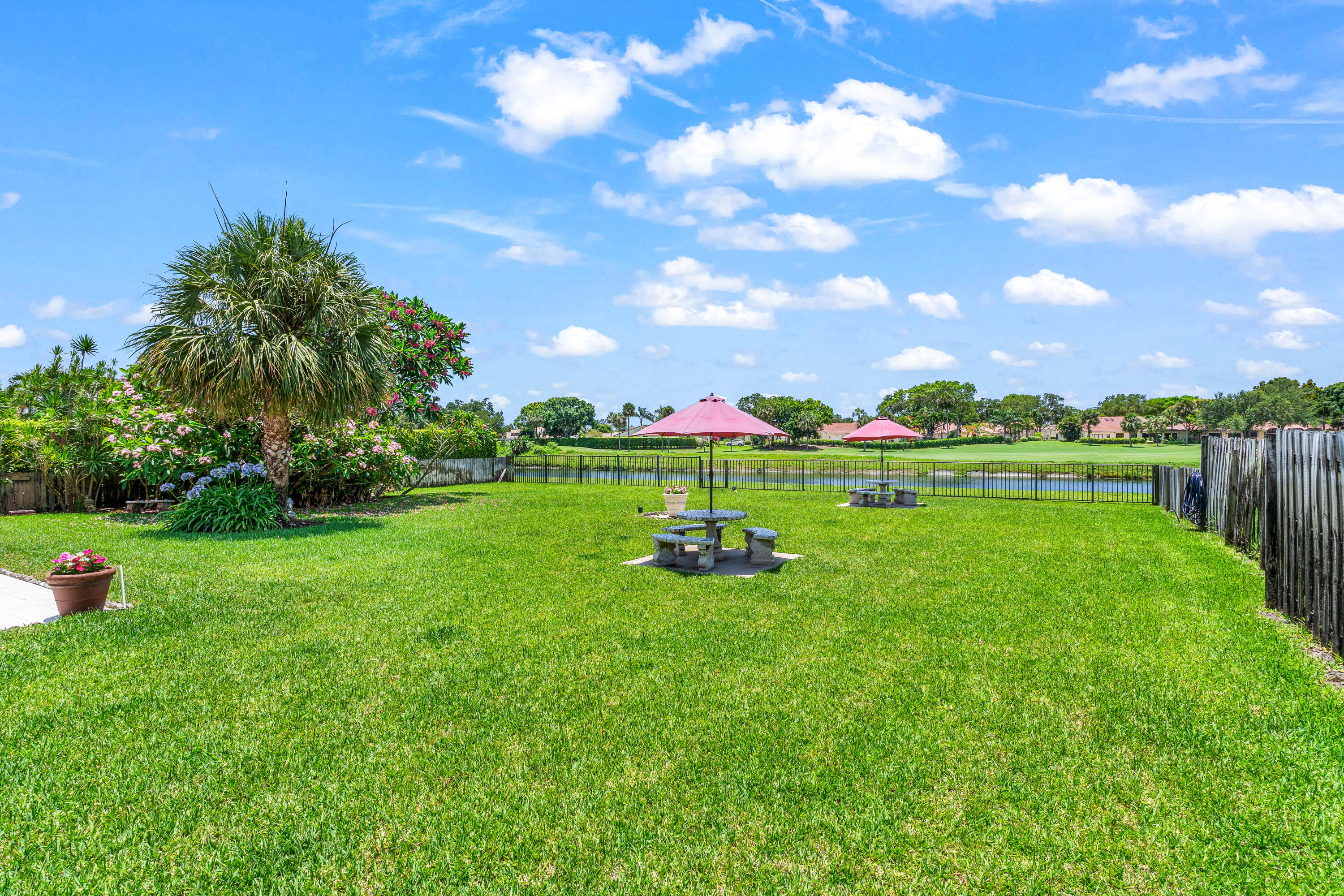 5986 Vista Linda Lane Boca Raton, FL 33433 - Photo 26 of 31 a view of a golf course with a garden