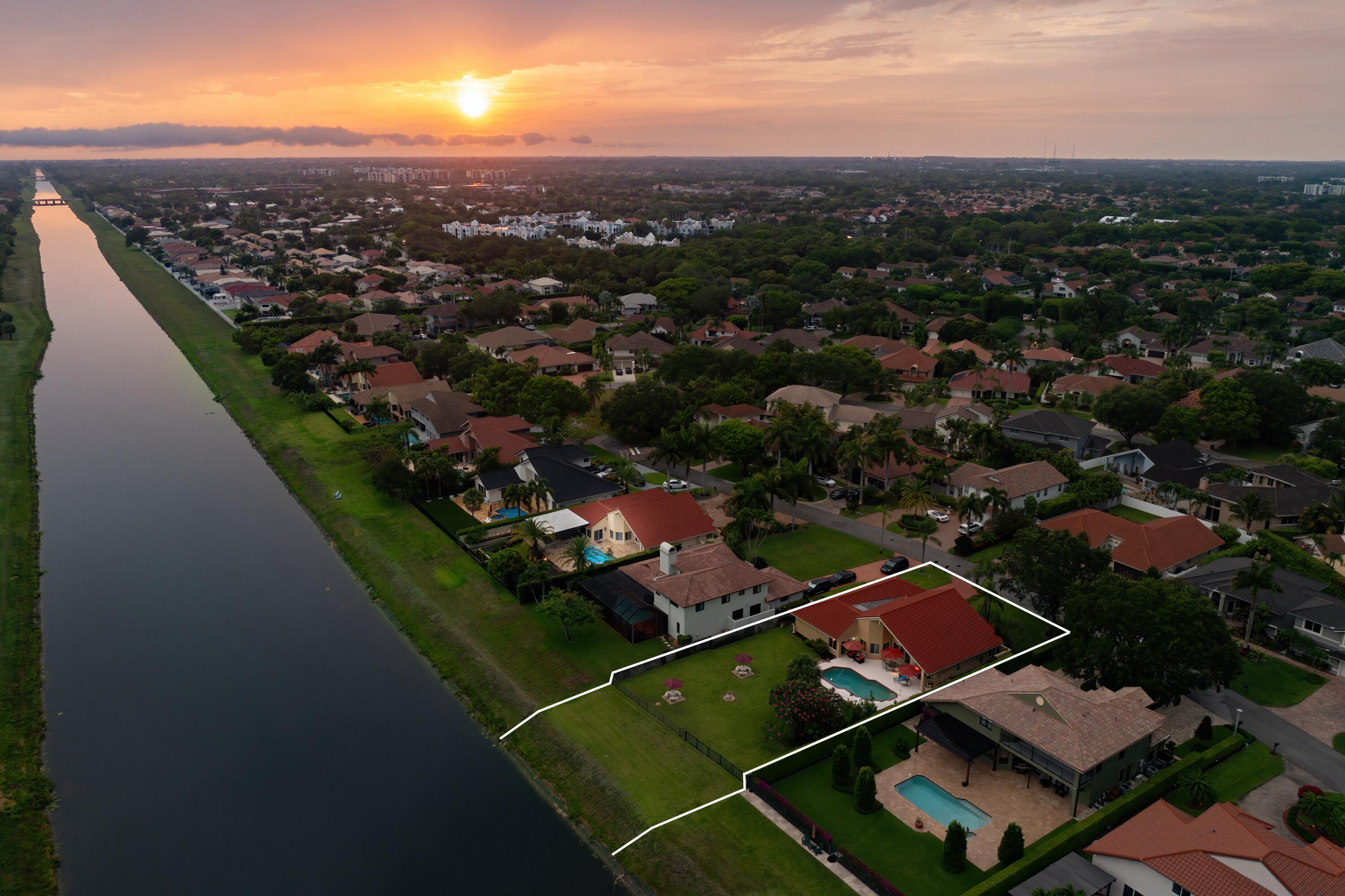 5986 Vista Linda Lane Boca Raton, FL 33433 - Photo 30 of 31 an aerial view of residential houses with outdoor space