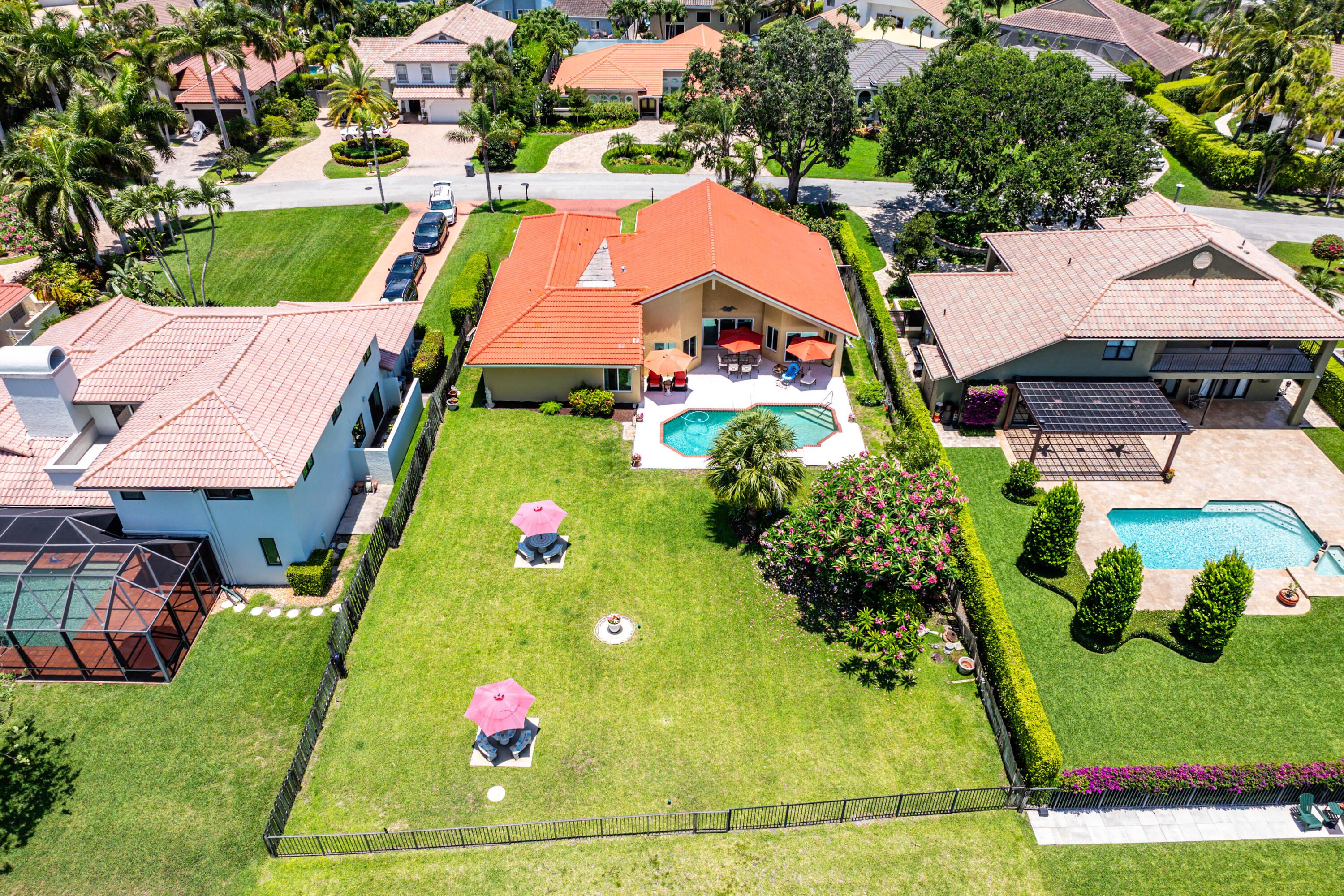 5986 Vista Linda Lane Boca Raton, FL 33433 - Photo 31 of 31 an aerial view of a tennis ground and large trees
