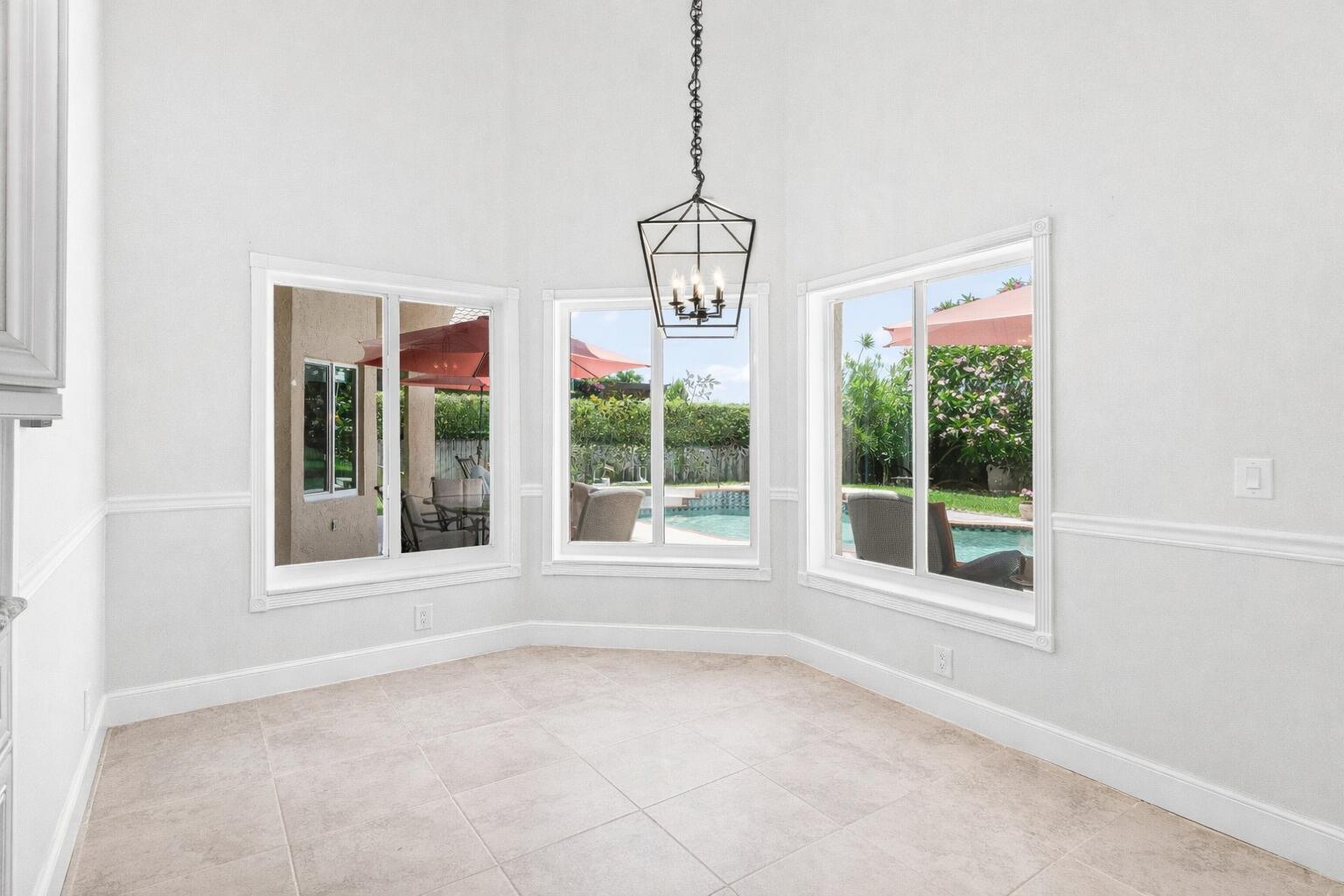 5986 Vista Linda Lane Boca Raton, FL 33433 - Photo 5 of 31 a view of an empty room with a window
