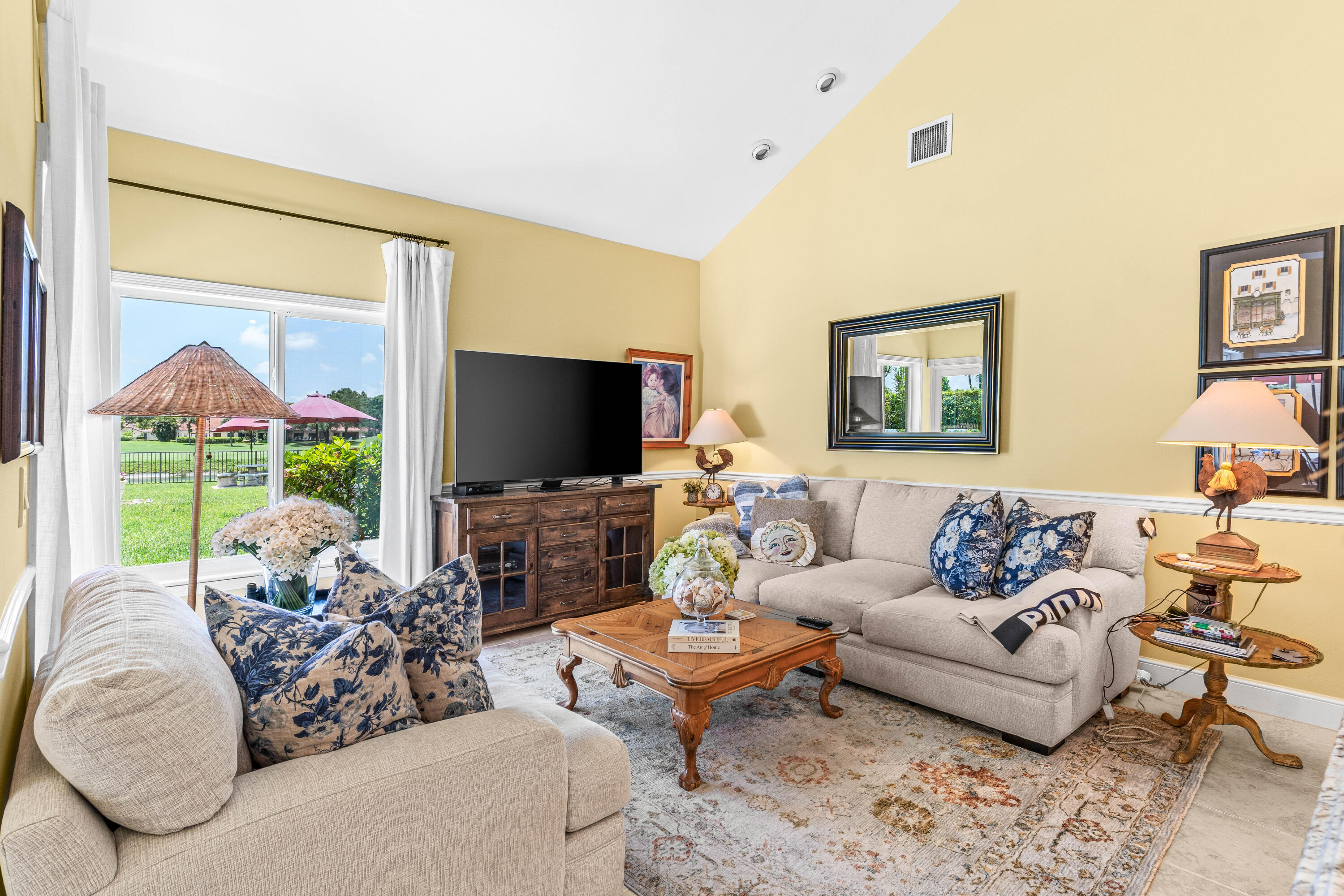 5986 Vista Linda Lane Boca Raton, FL 33433 - Photo 8 of 31 a living room with furniture large window and a flat screen tv