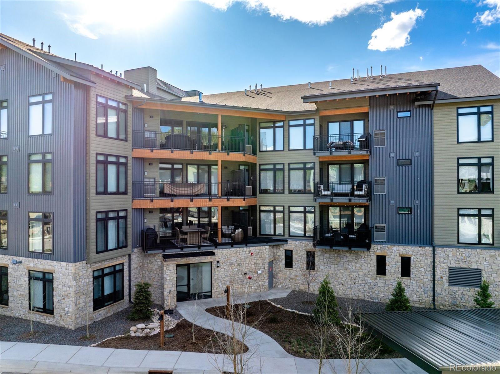 144 Ski Idlewild Road, Unit 3201 Winter Park, CO 80482 - Photo 35 of 39 a view of a building with many windows