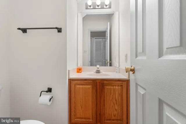 a view of bathroom with dual sinks