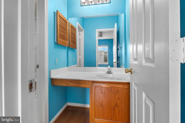 a room that has a sink and a mirror