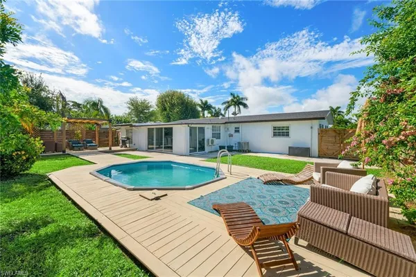 a view of outdoor space yard swimming pool and patio