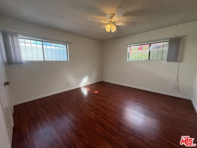 a view of livingroom with hardwood floor and window