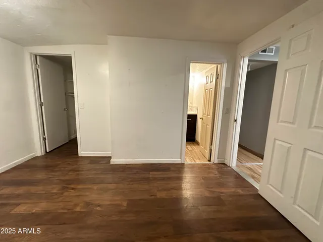 a view of entryway with wooden floor