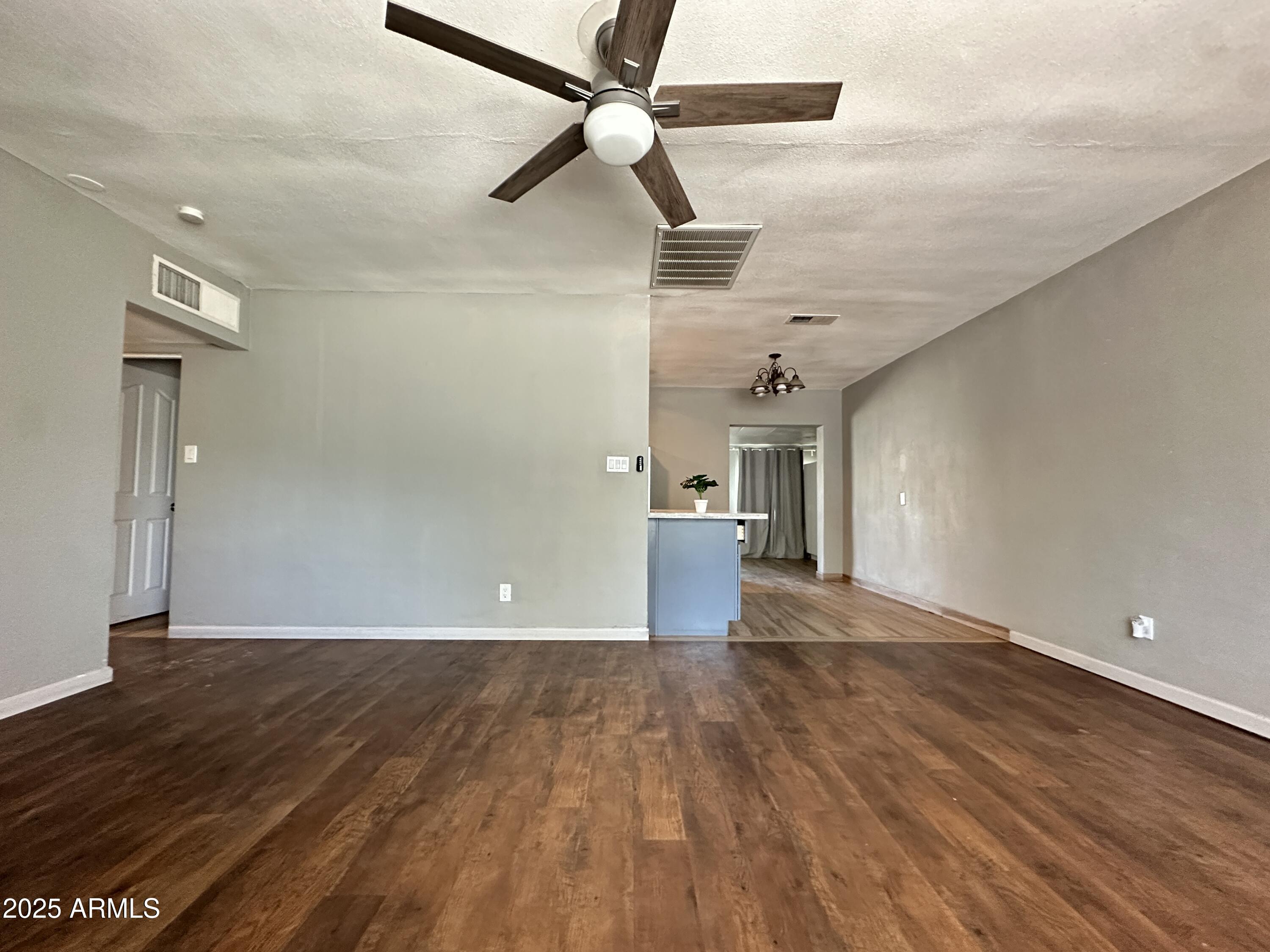 1340 East Hall Street Tempe, AZ 85281 - Photo 6 of 21 a view of a livingroom with wooden floor