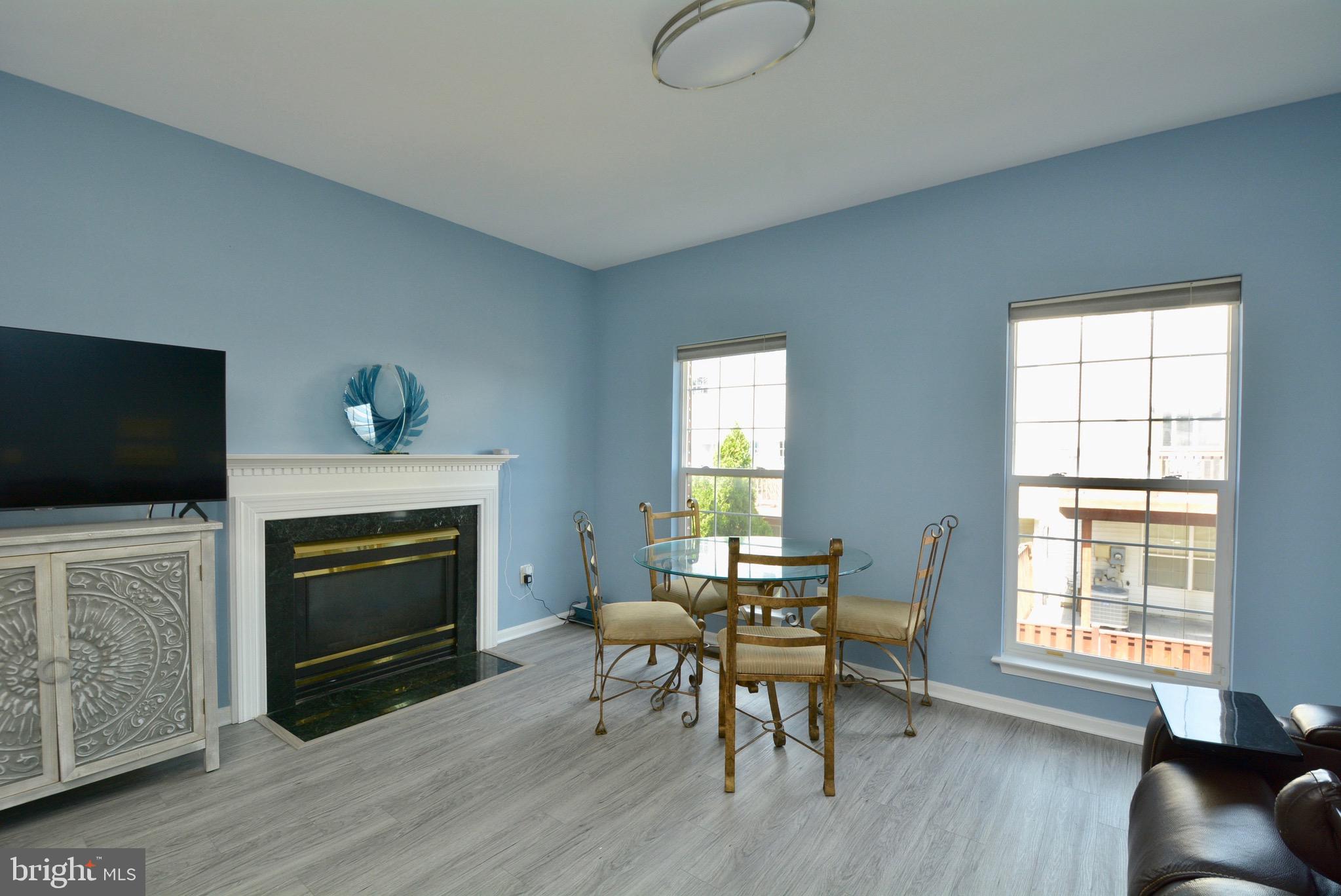 8361 Regal Oak Court Springfield, VA 22152 - Photo 16 of 43 Eatin in Kitchen with fireplace