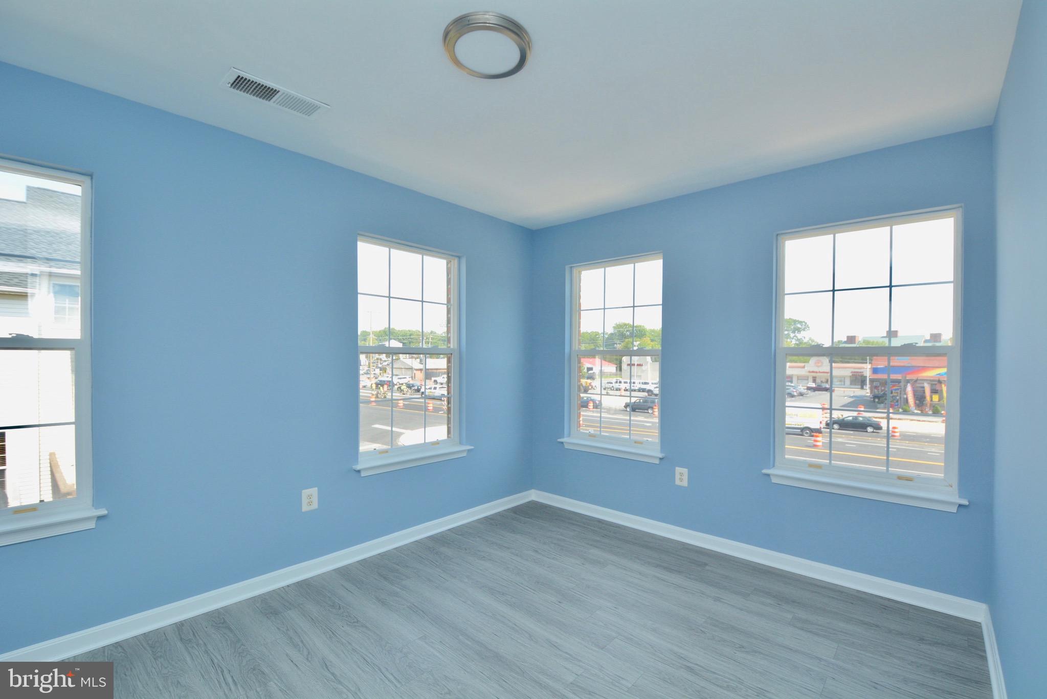 8361 Regal Oak Court Springfield, VA 22152 - Photo 23 of 43 Bedroom 2 with Brand new LVT, Paint, fixture