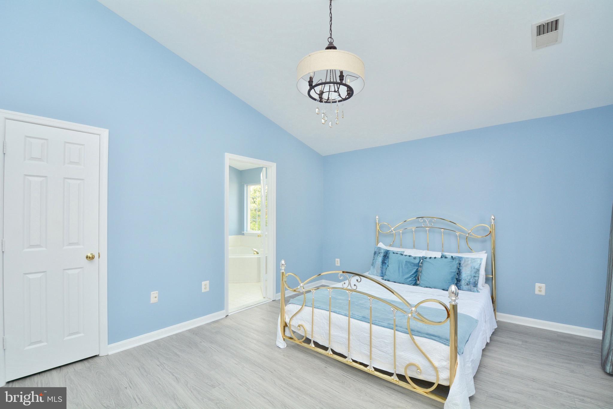 8361 Regal Oak Court Springfield, VA 22152 - Photo 31 of 43 Master bedroom w/new LVT, Paint and fixtures