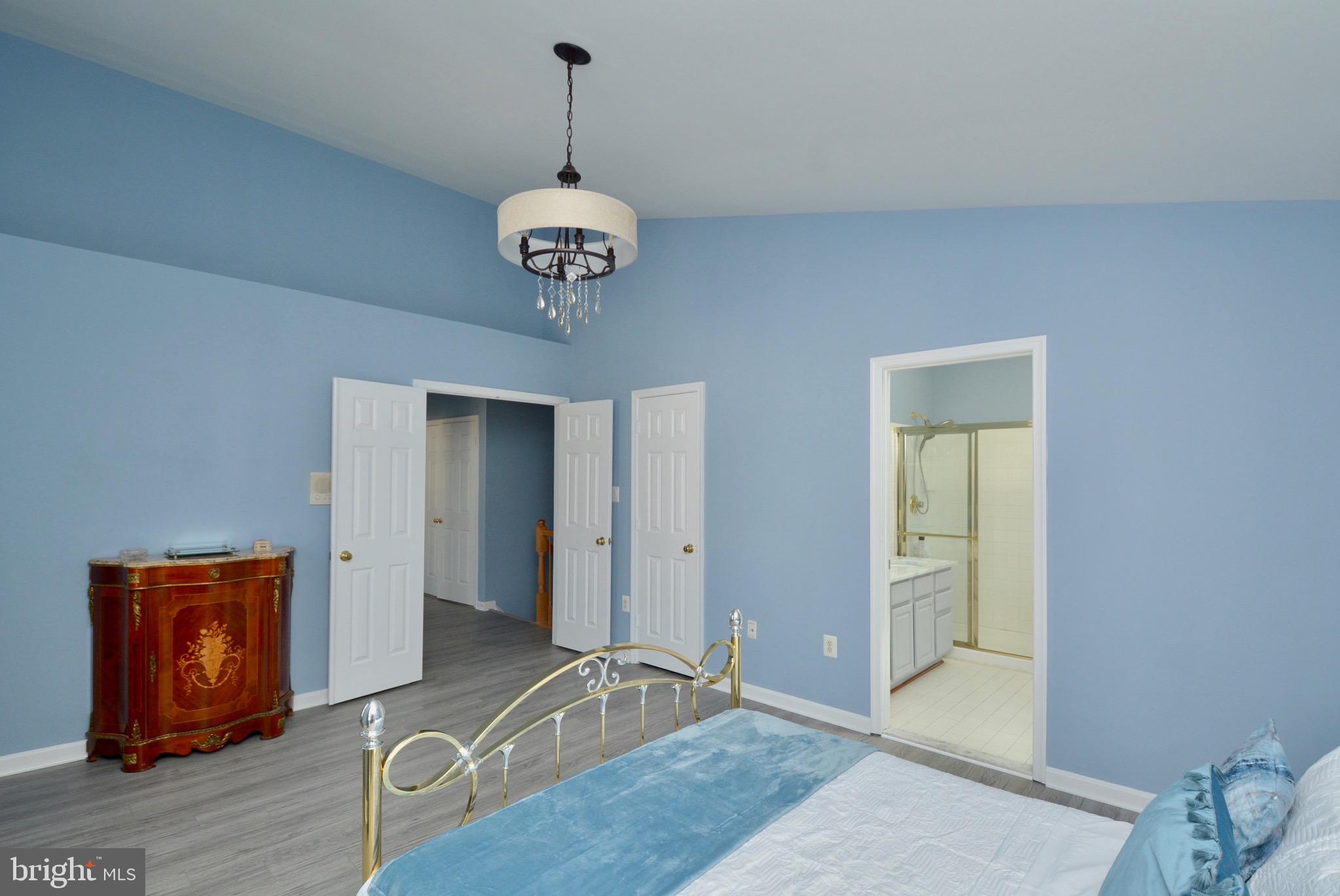 8361 Regal Oak Court Springfield, VA 22152 - Photo 32 of 43 Master bedroom w/new LVT, Paint and fixtures