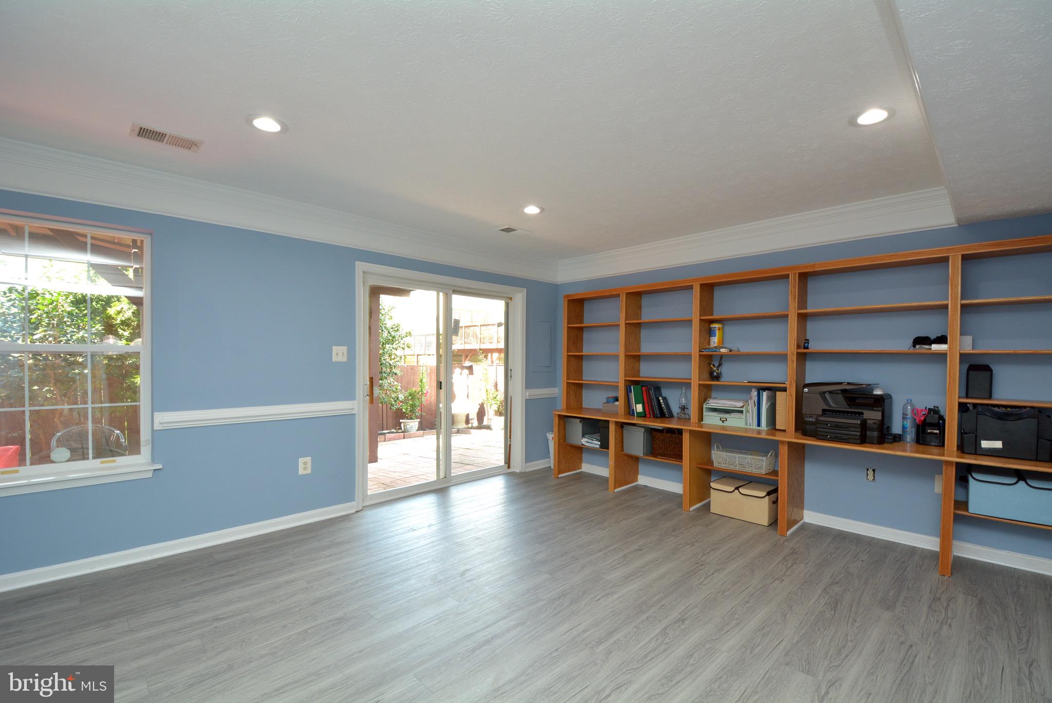 8361 Regal Oak Court Springfield, VA 22152 - Photo 35 of 43 Lower level walk out with built in shelving