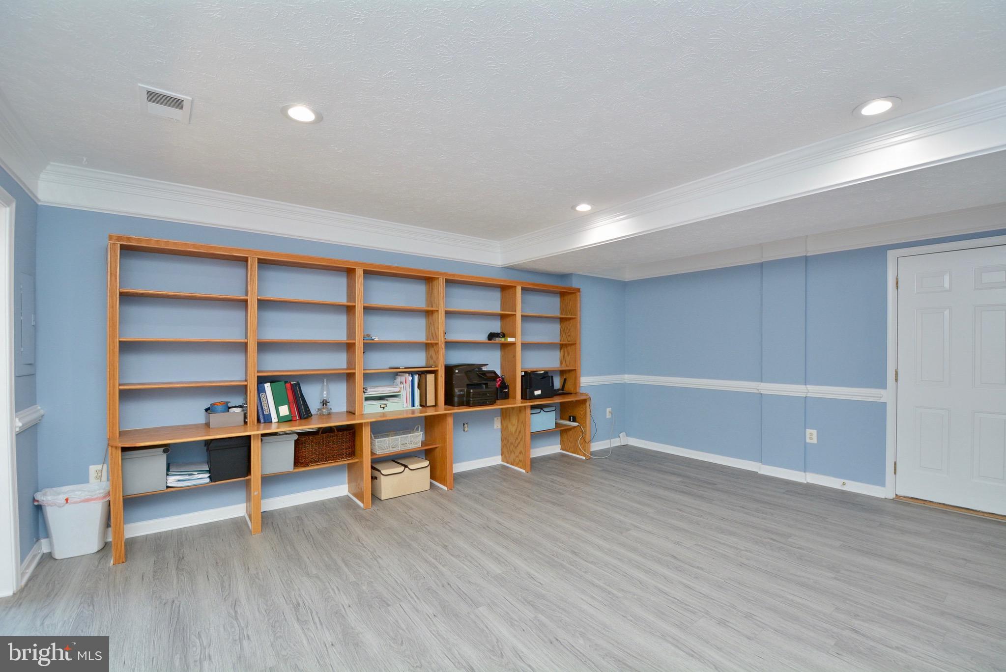 8361 Regal Oak Court Springfield, VA 22152 - Photo 37 of 43 Lower level walk out with built in shelving