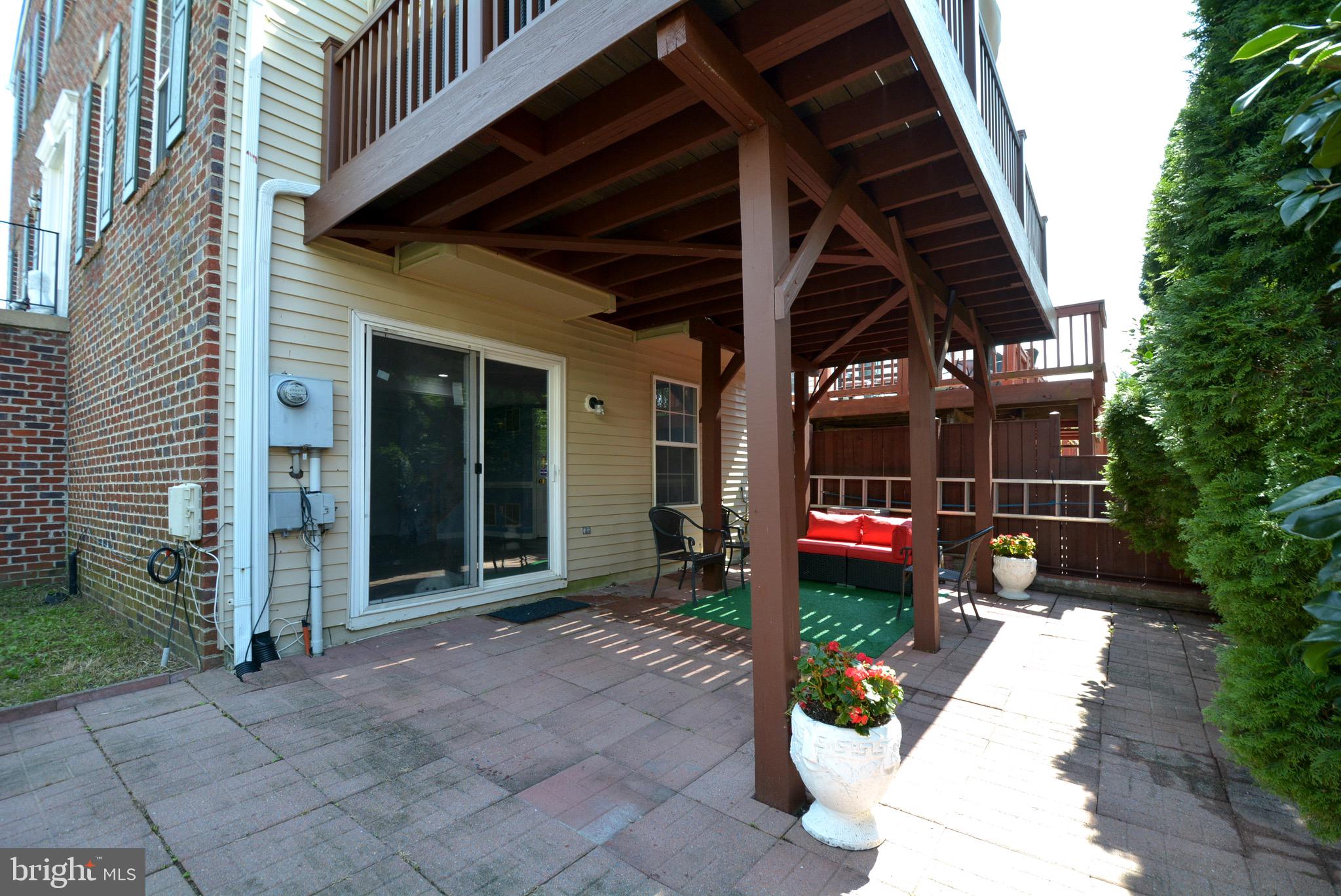 8361 Regal Oak Court Springfield, VA 22152 - Photo 42 of 43 Patio below the gorgeous deck, walk out basement