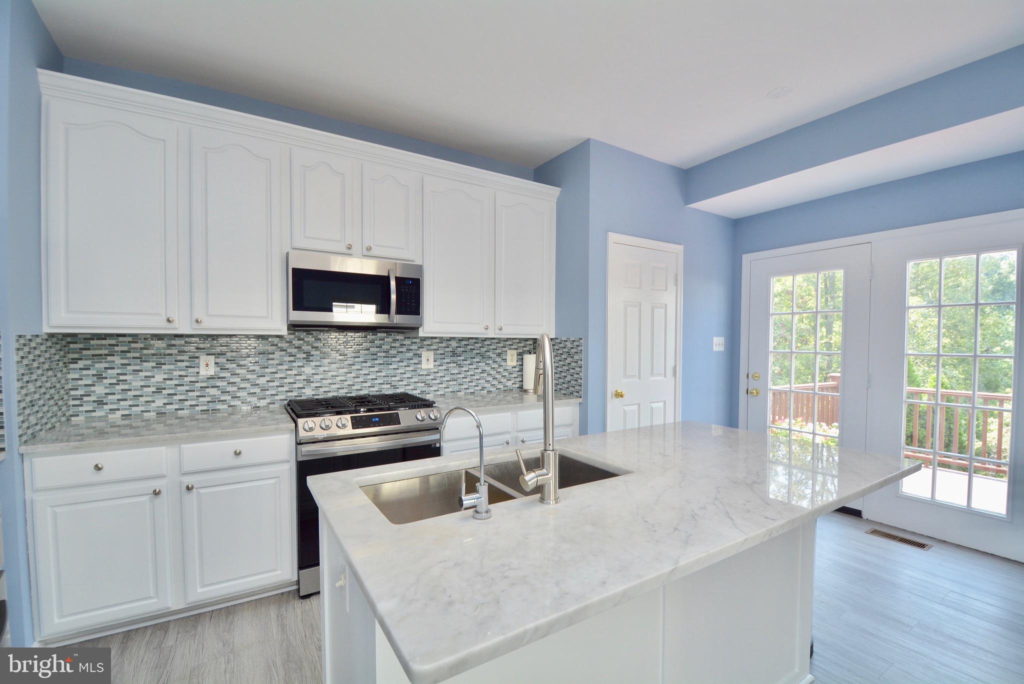 8361 Regal Oak Court Springfield, VA 22152 - Photo 9 of 43 Giant kitchen with large island & pantry closet