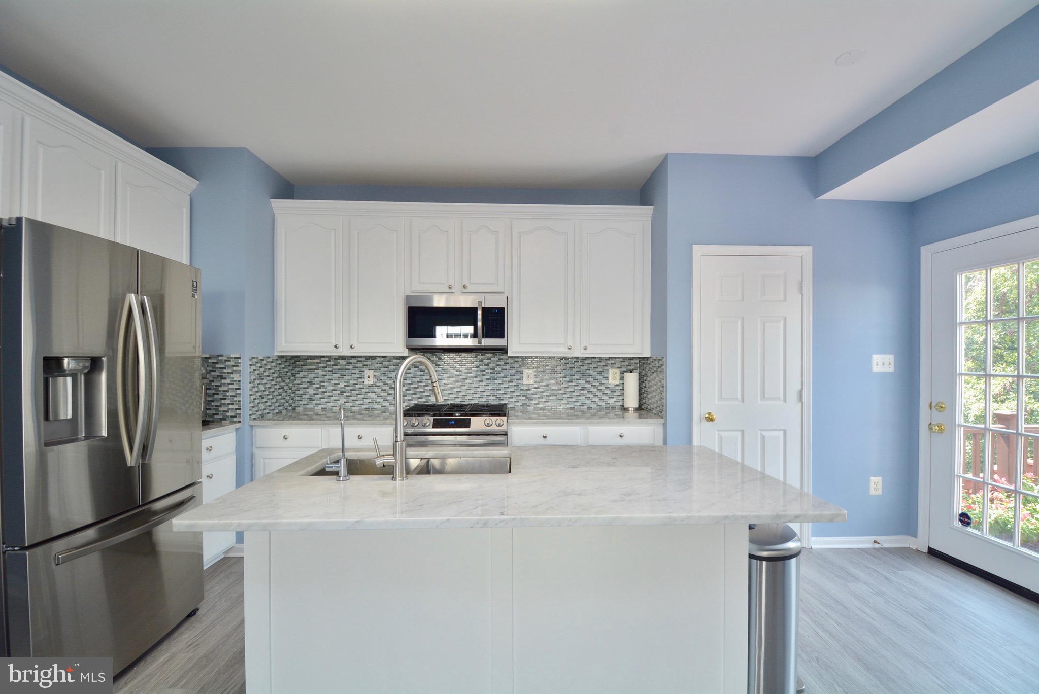 8361 Regal Oak Court Springfield, VA 22152 - Photo 10 of 43 Large island with pantry closet