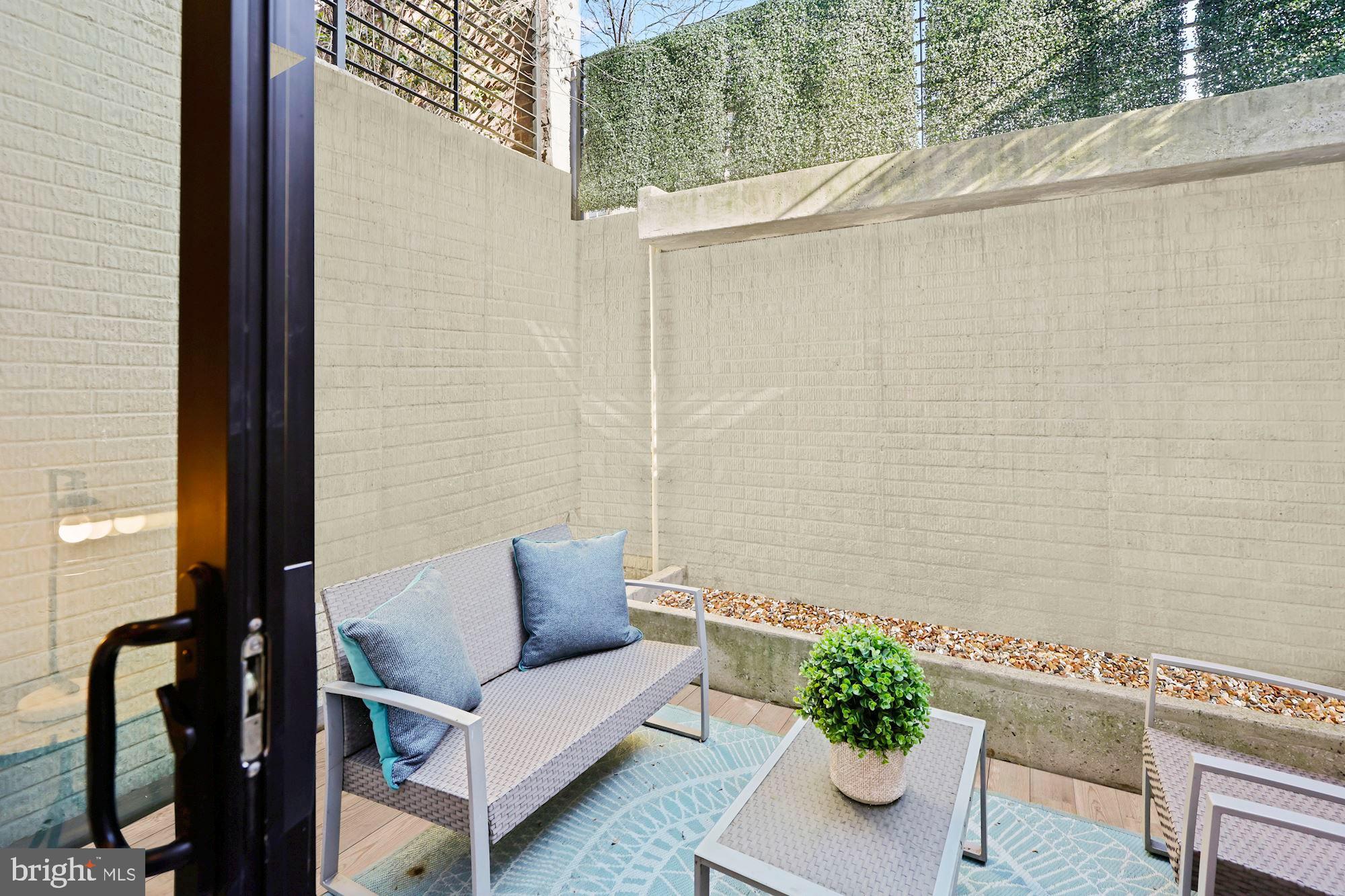 2140 Wisconsin Avenue Northwest, Unit 1 Washington, DC 20007 - Photo 15 of 31 Wall-to-Wall Wide Sliding Glass Doors
