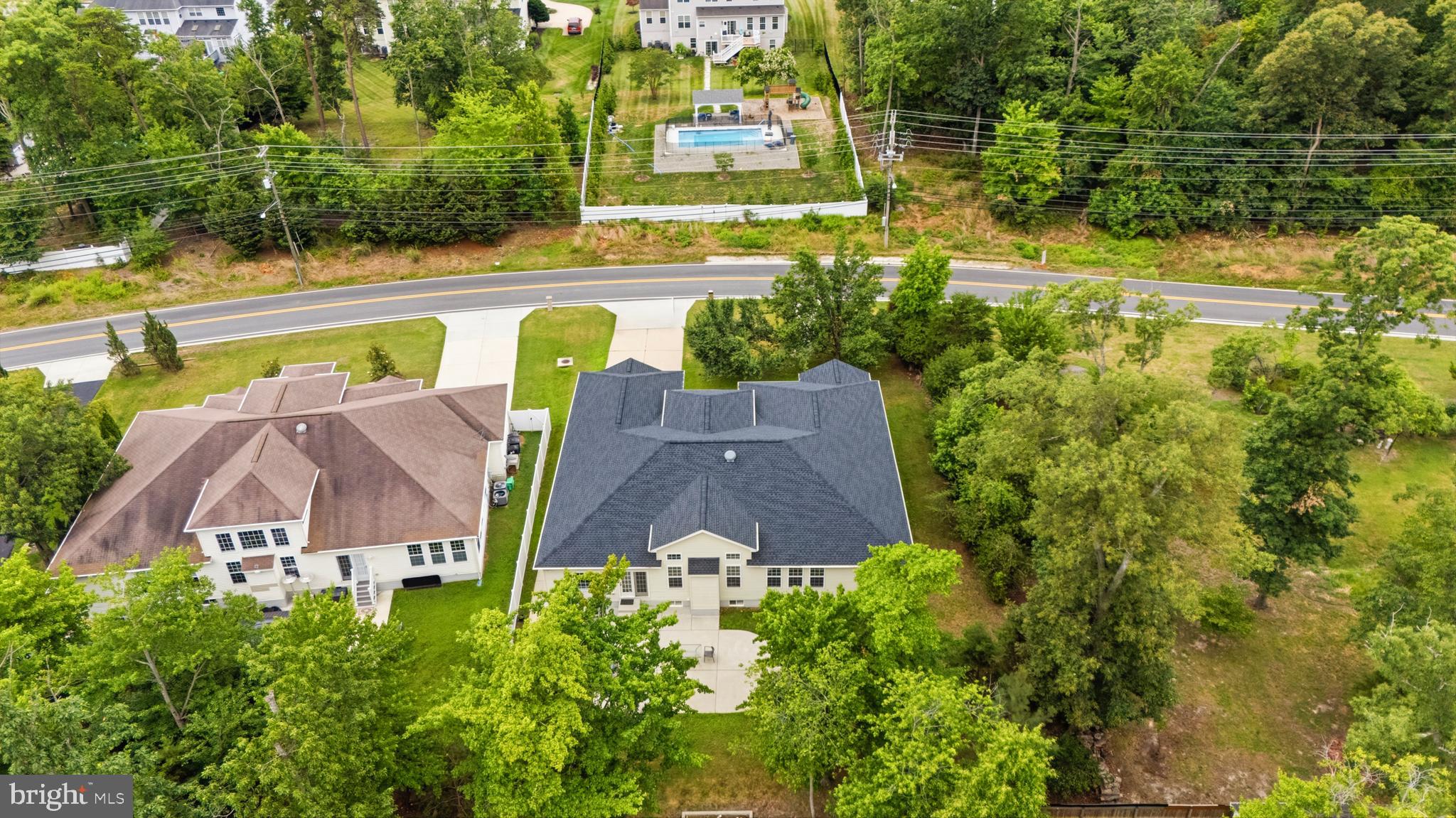 13305 Old Fort Road Fort Washington, MD 20744 - Photo 58 of 65 an aerial view of a house with a garden and trees all around