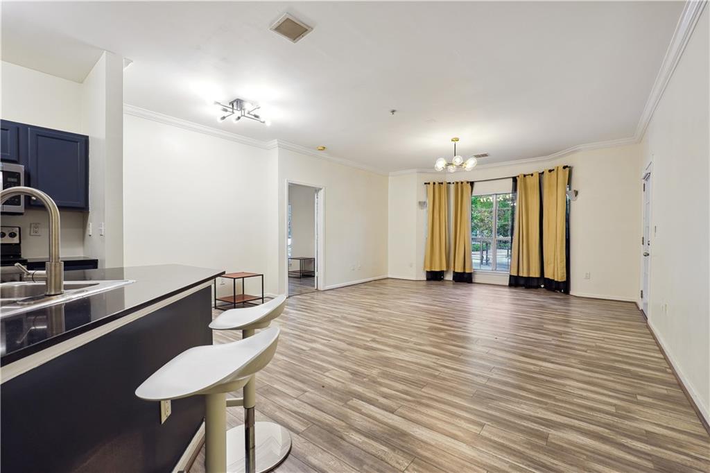 5641 Roswell Road, Unit 103 Atlanta, GA 30342 - Photo 4 of 27 a view of a room with gym equipment