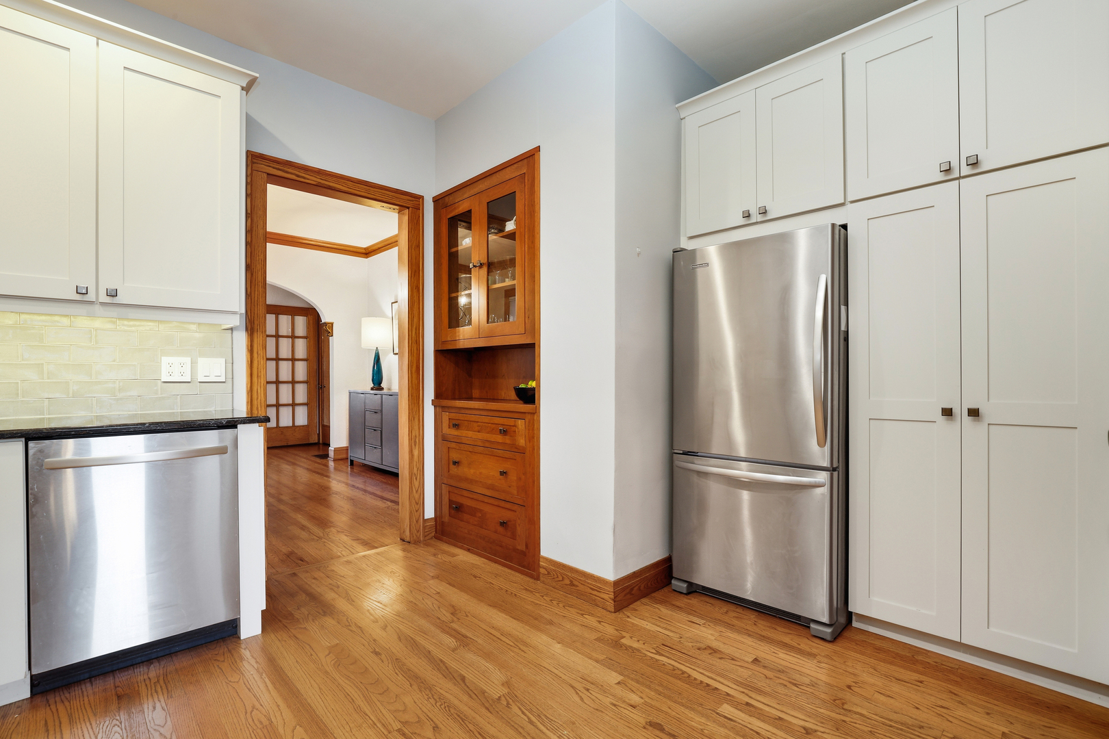 9031 Fairview Avenue Brookfield, IL 60513 - Photo 12 of 35 a kitchen with stainless steel appliances granite countertop a refrigerator and a stove top oven