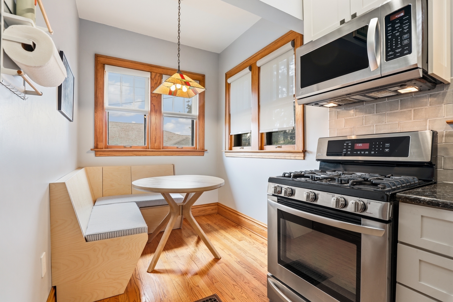 9031 Fairview Avenue Brookfield, IL 60513 - Photo 13 of 35 a kitchen with stainless steel appliances a stove a sink and a microwave