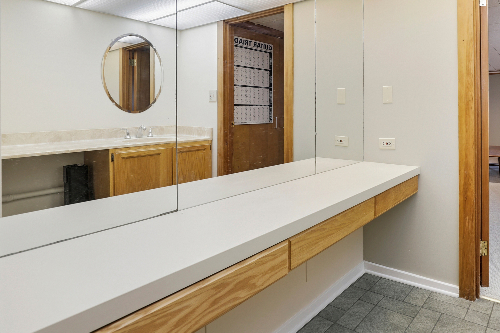 9031 Fairview Avenue Brookfield, IL 60513 - Photo 23 of 35 a bathroom with a sink and a mirror