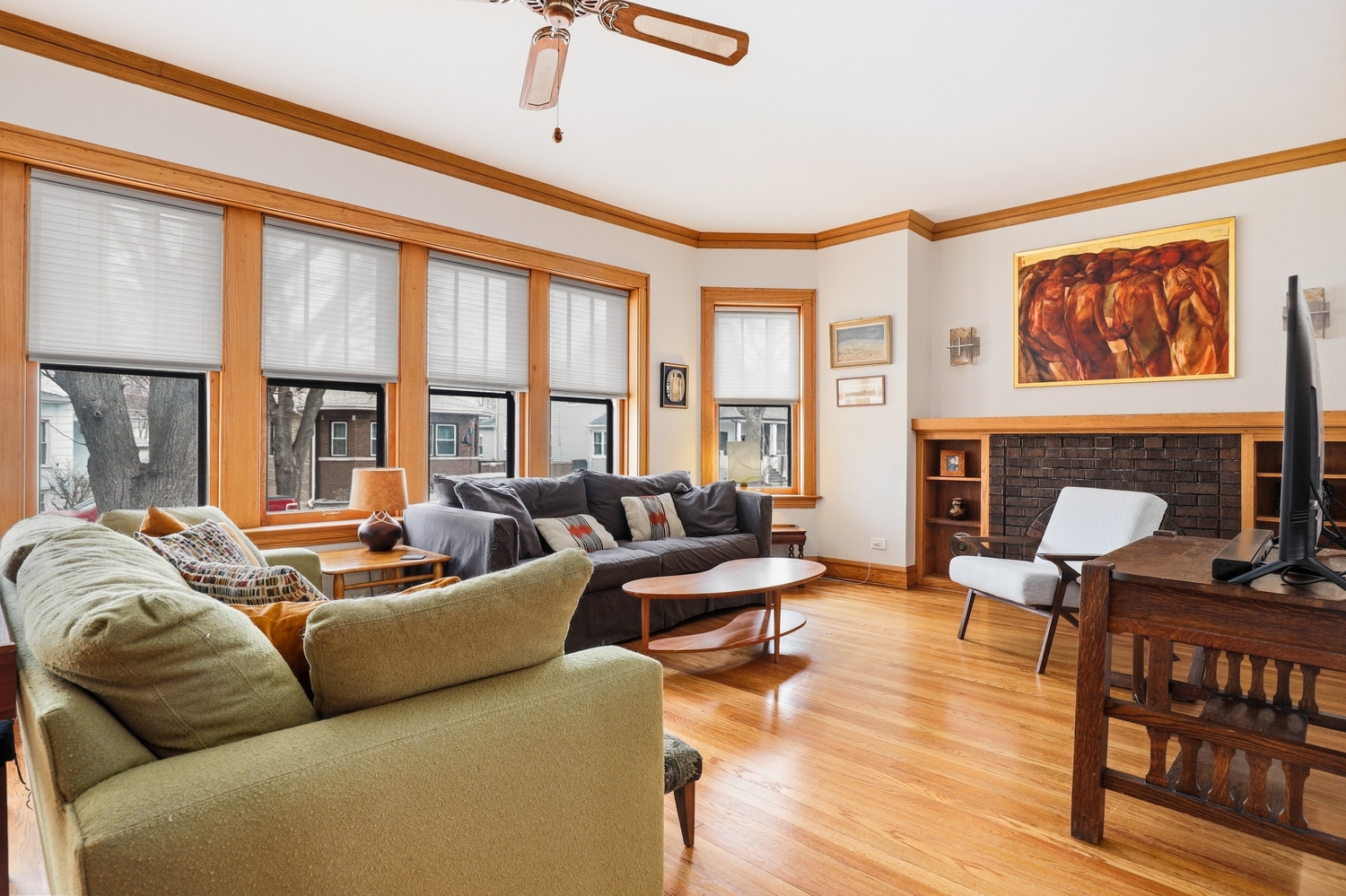 9031 Fairview Avenue Brookfield, IL 60513 - Photo 3 of 35 a living room with furniture a fireplace and a large window