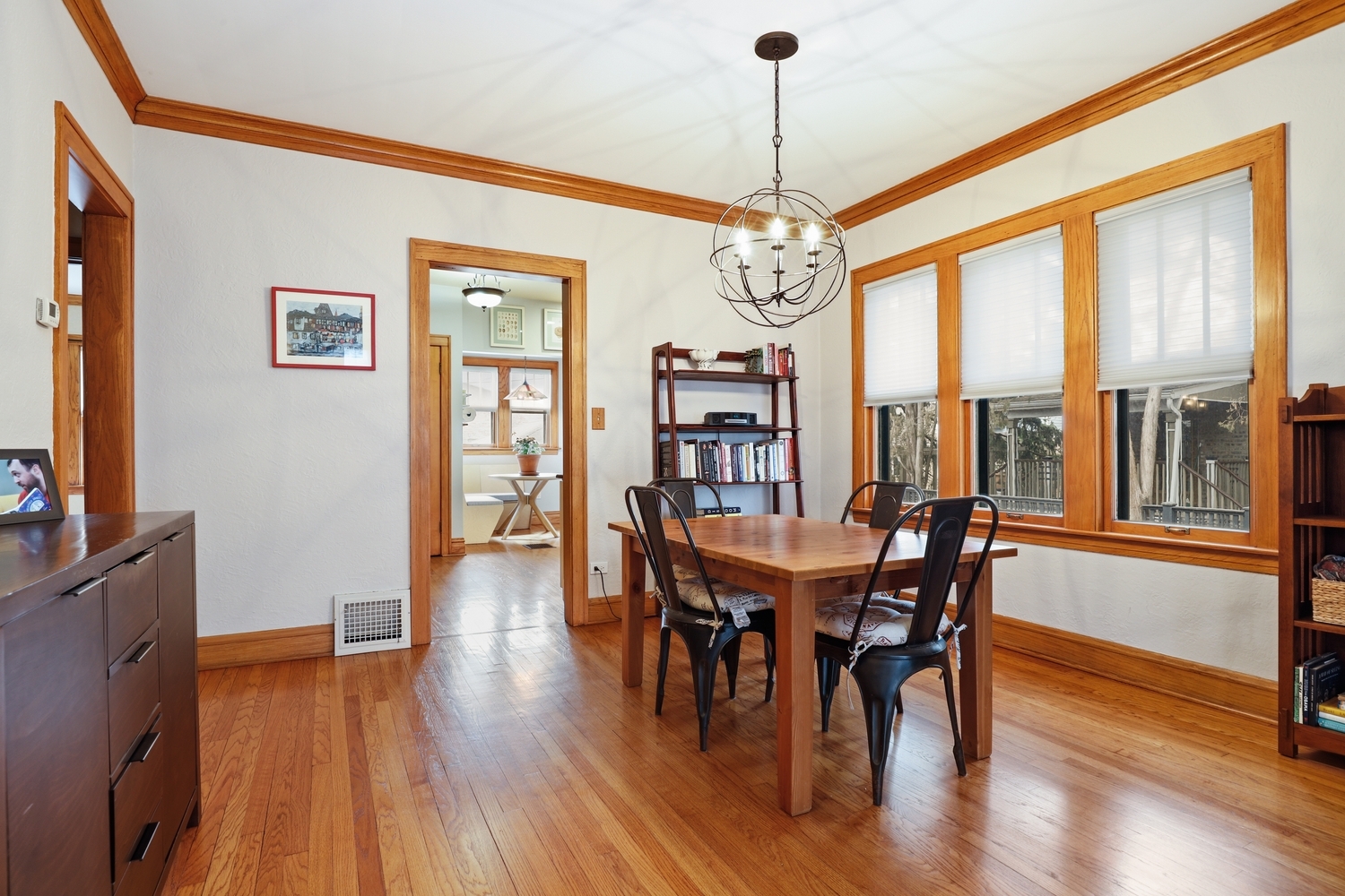 9031 Fairview Avenue Brookfield, IL 60513 - Photo 8 of 35 a view of a dining room with furniture window and wooden floor