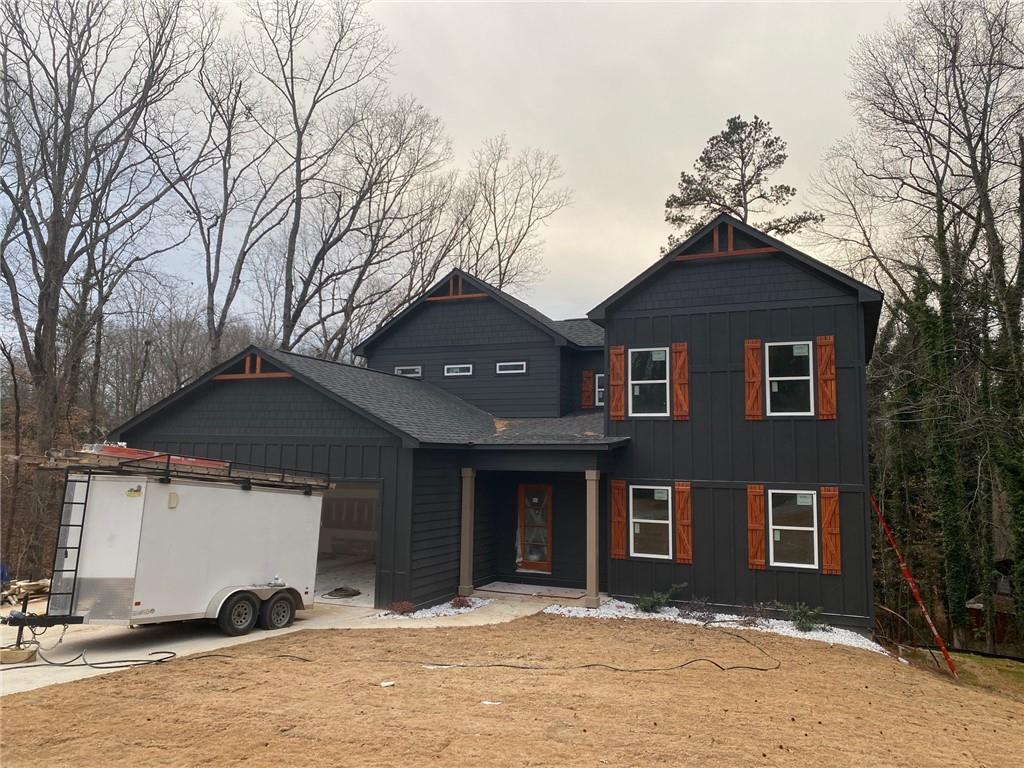 6121 Timberidge Drive Gainesville, GA 30506 - Photo 1 of 25 a front view of a house with a yard