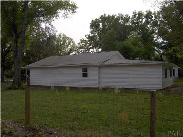 5424 Tom Sawyer Road Milton, FL 32583 - Photo 5 of 19 Back view of home...