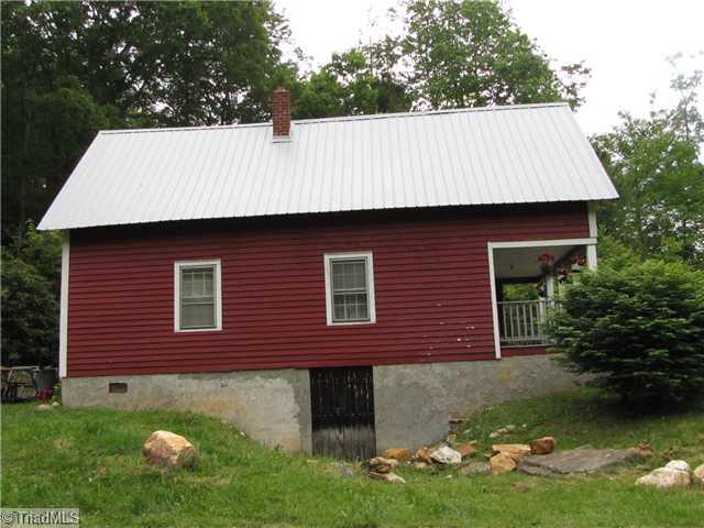 150 Friendship Church Road Lansing, NC 28643 - Photo 3 of 16 Exterior Back.