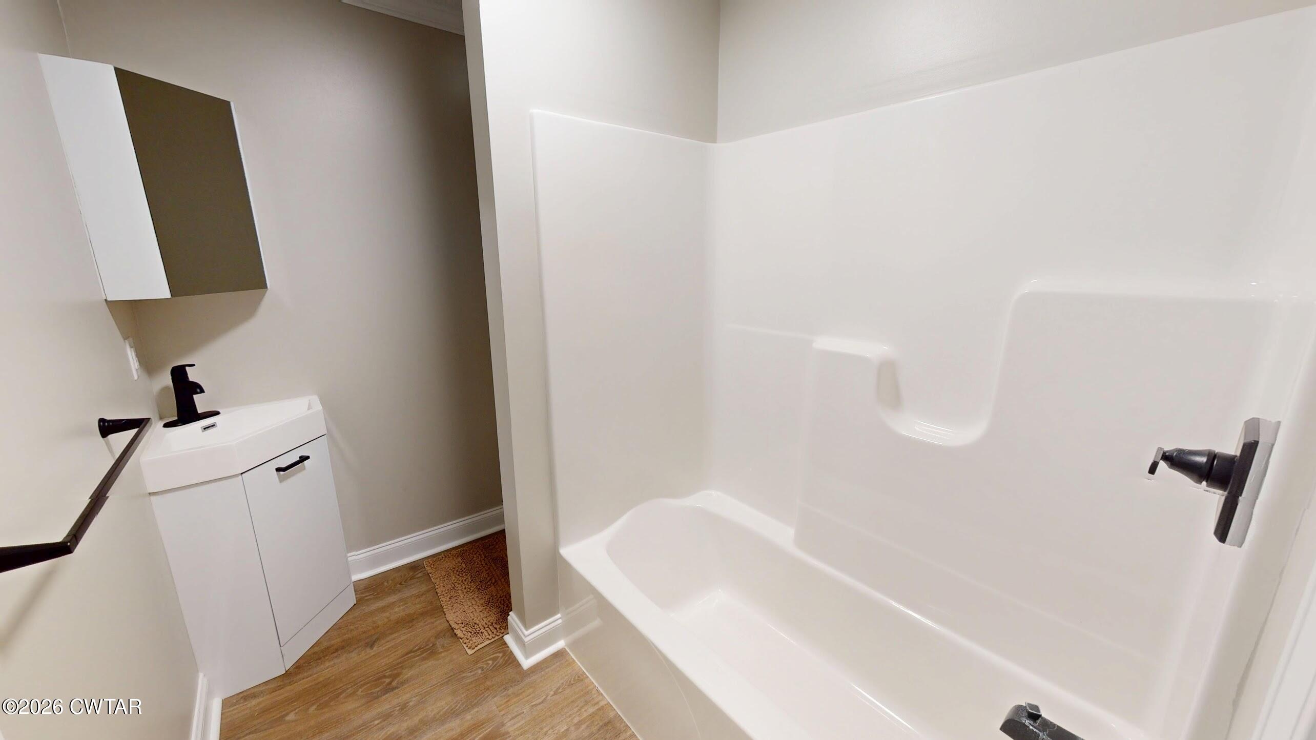 2800 Locust Grove Road Newbern, TN 38059 - Photo 42 of 46 a bathroom with a bathtub