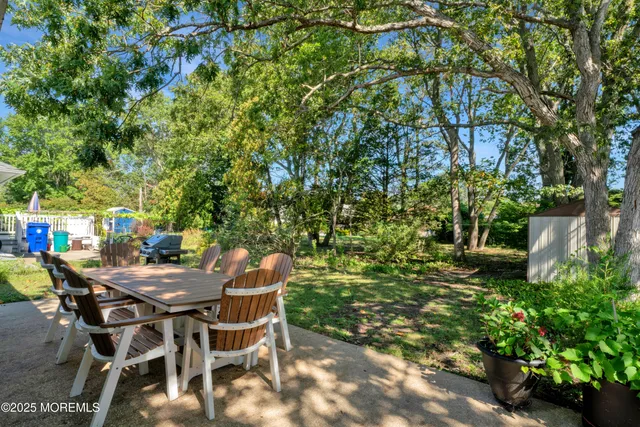 a view of an outdoor space with table and chair