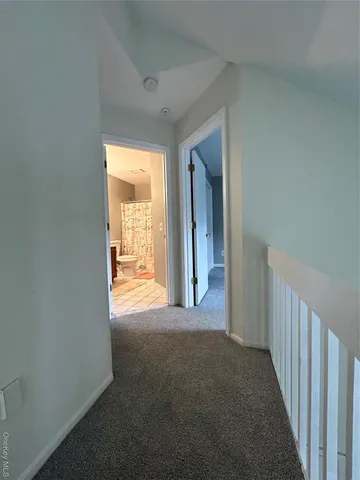 a balcony with wooden floor