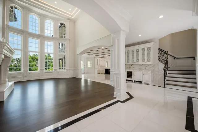 a living room with furniture and windows