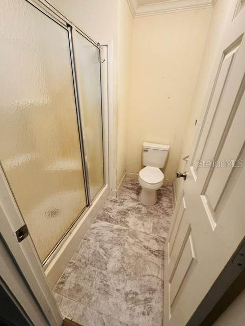 11817 Southwest 58th Street Webster, FL 33597 - Photo 17 of 46 a bathroom with a granite countertop sink toilet and shower