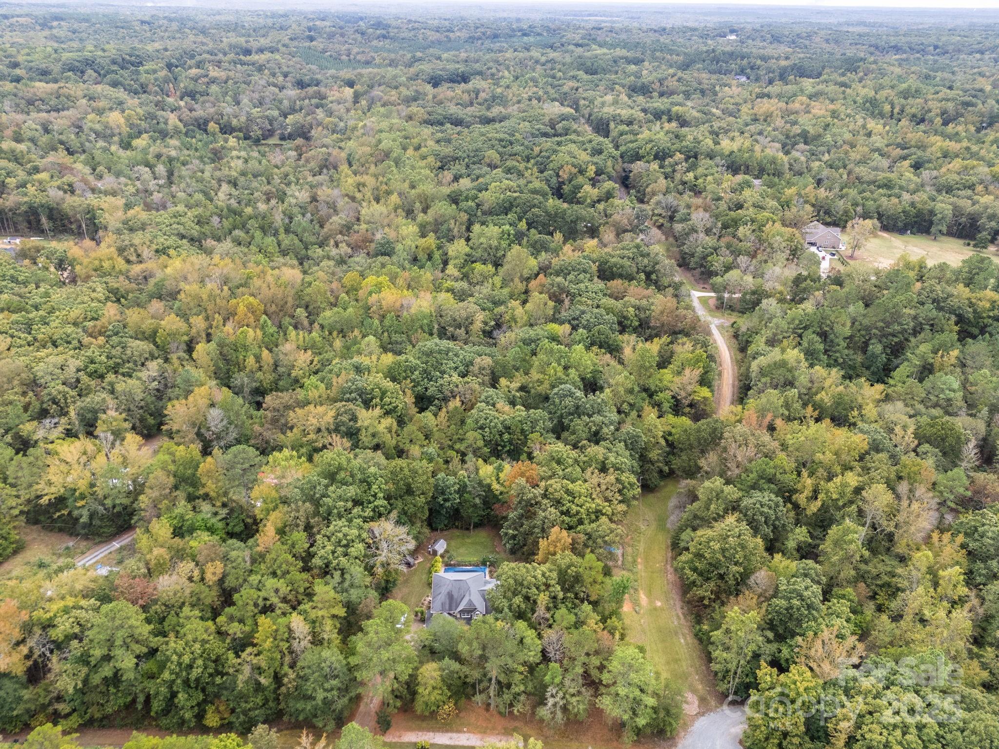 8001 Rillwood Drive Waxhaw, NC 28173 - Photo 10 of 16 an aerial view of residential houses with outdoor space